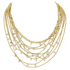 Collar Cartier Draperie de 10 vueltas con diamantes en oro amarillo de 18 quilates