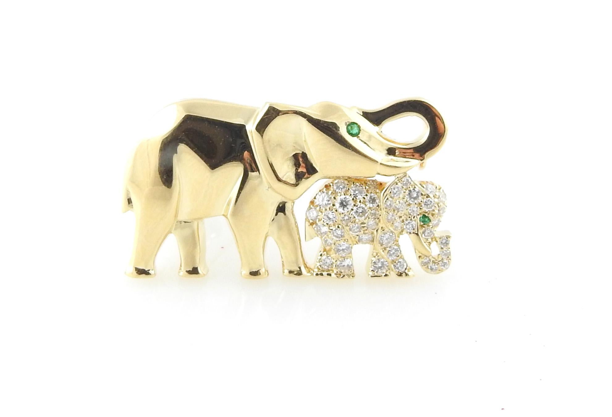 Cartier 18K Yellow Gold Mother and Baby Elephant Brooch

This touching Cartier brooch is set in 18K yellow gold. The mother and baby elephant both feature a genuine emerald eye.

Baby elephant is set with .50cts of round brilliant diamonds. Diamonds