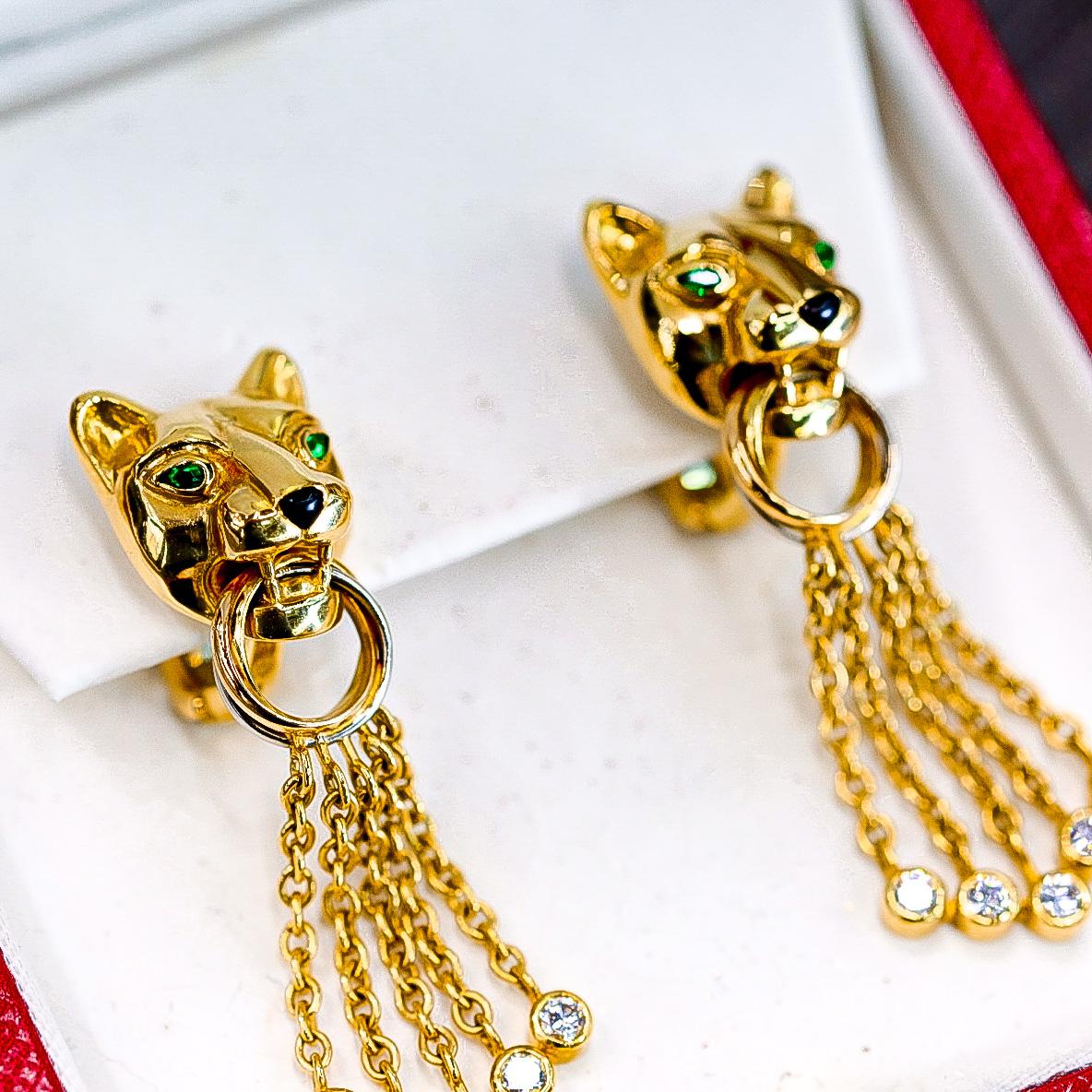 Diamond, Emerald, Onyx and Yellow Gold Bead ‘Panthère’ Earrings, Cartier.

Cartier’s first use of the panther motif was a 1914 watch with diamonds and onyx set in platinum. The panther has been an enduring symbol of the house ever since, and these