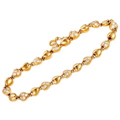 Cartier 18 Karat Yellow Gold Diamond Heart Link Bracelet
