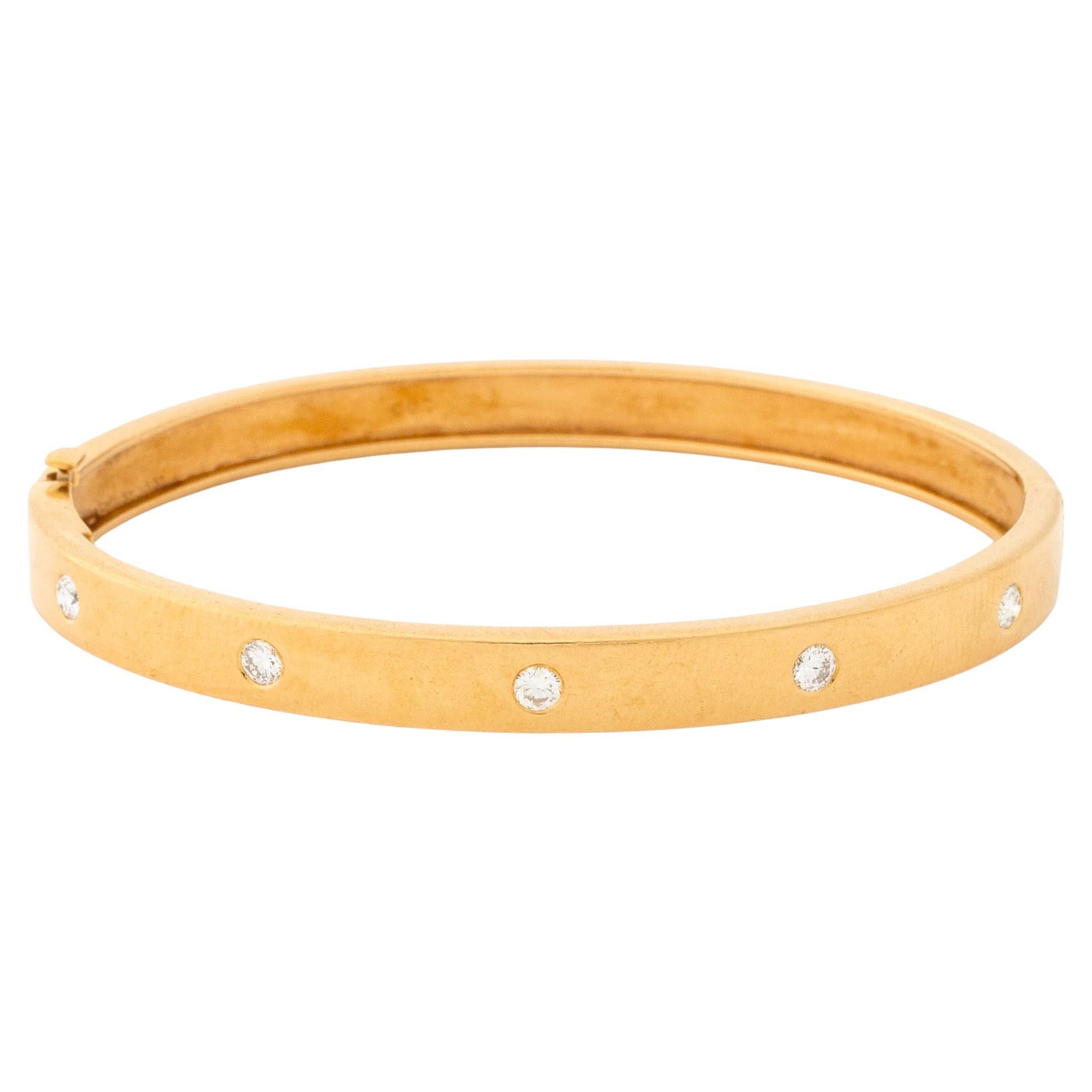Bracelet à charnière en or jaune 18K avec diamants de Cartier en vente