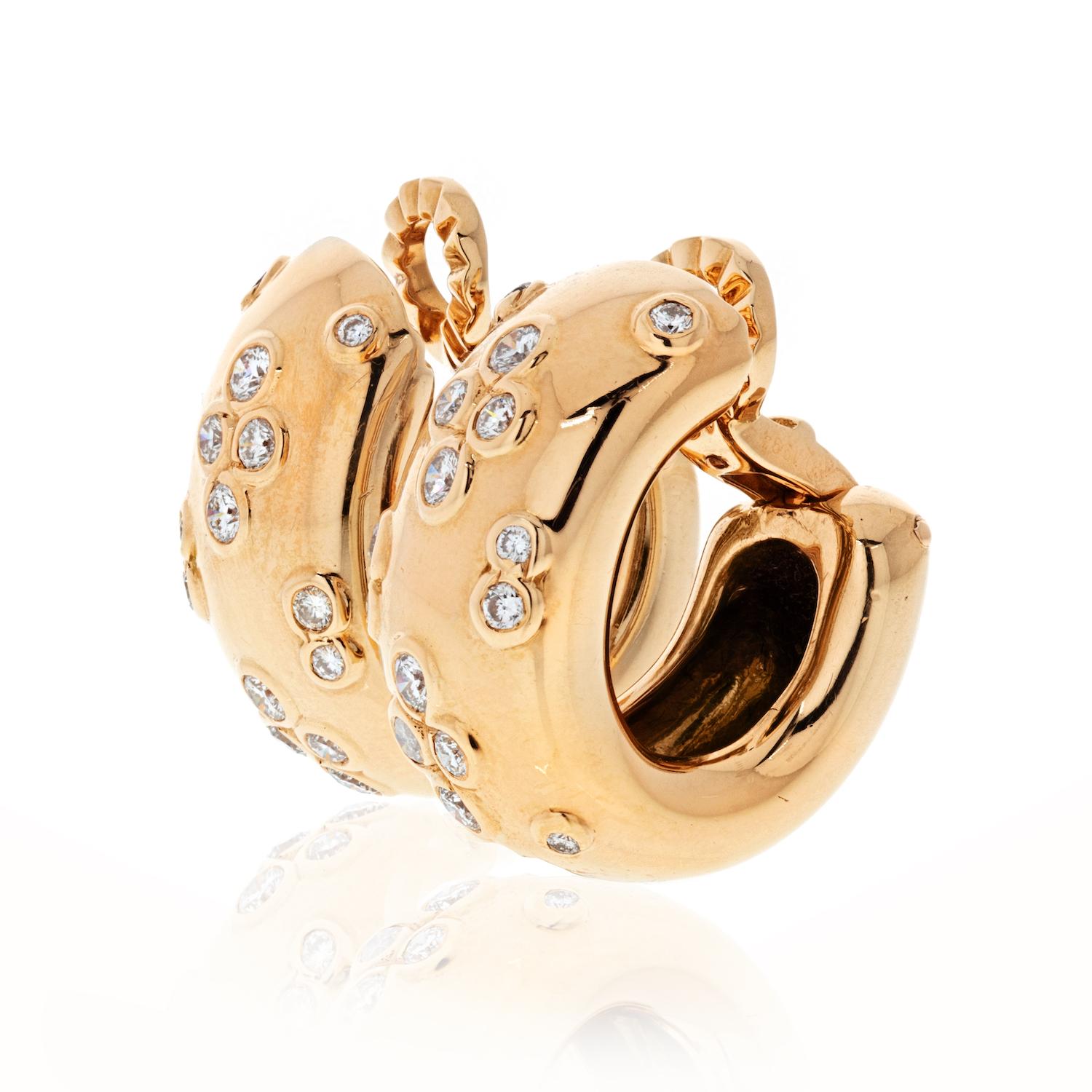Comfortable for everyday wear this classic design will never go out of style especially when it's Cartier. Excellent like-new condition these earrings boast brilliant round diamonds that add a touch of sparkle to your favorite outfit. 

Just about