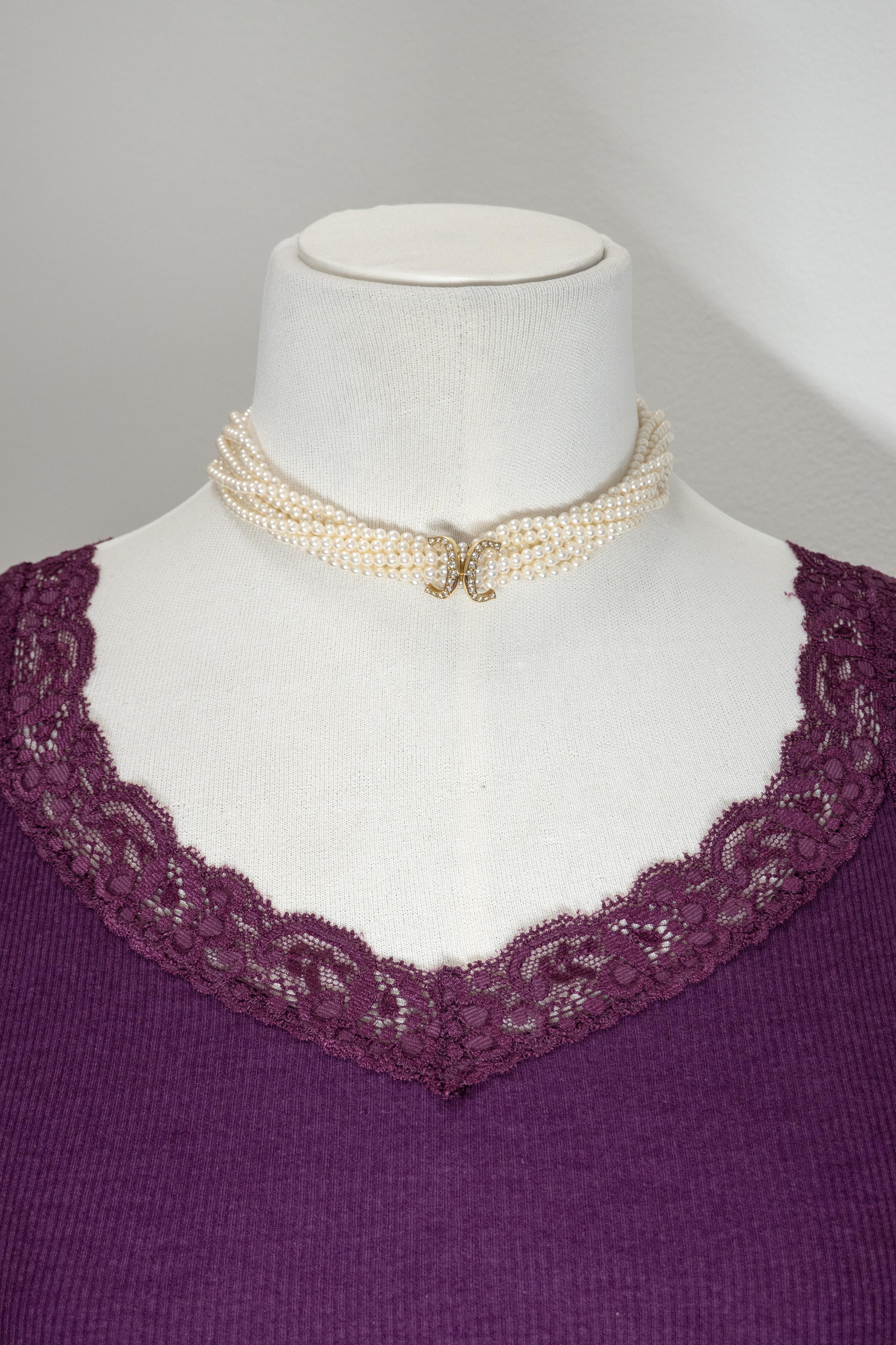1984 Cartier 18K yellow gold diamond double C multi strand pearl necklace set with 26 round brilliant cut diamonds approximate in F-G color VS clarity, certificate of authenticity with purchase.

Approximate Gross Weight: 58.6 grams

Approximate