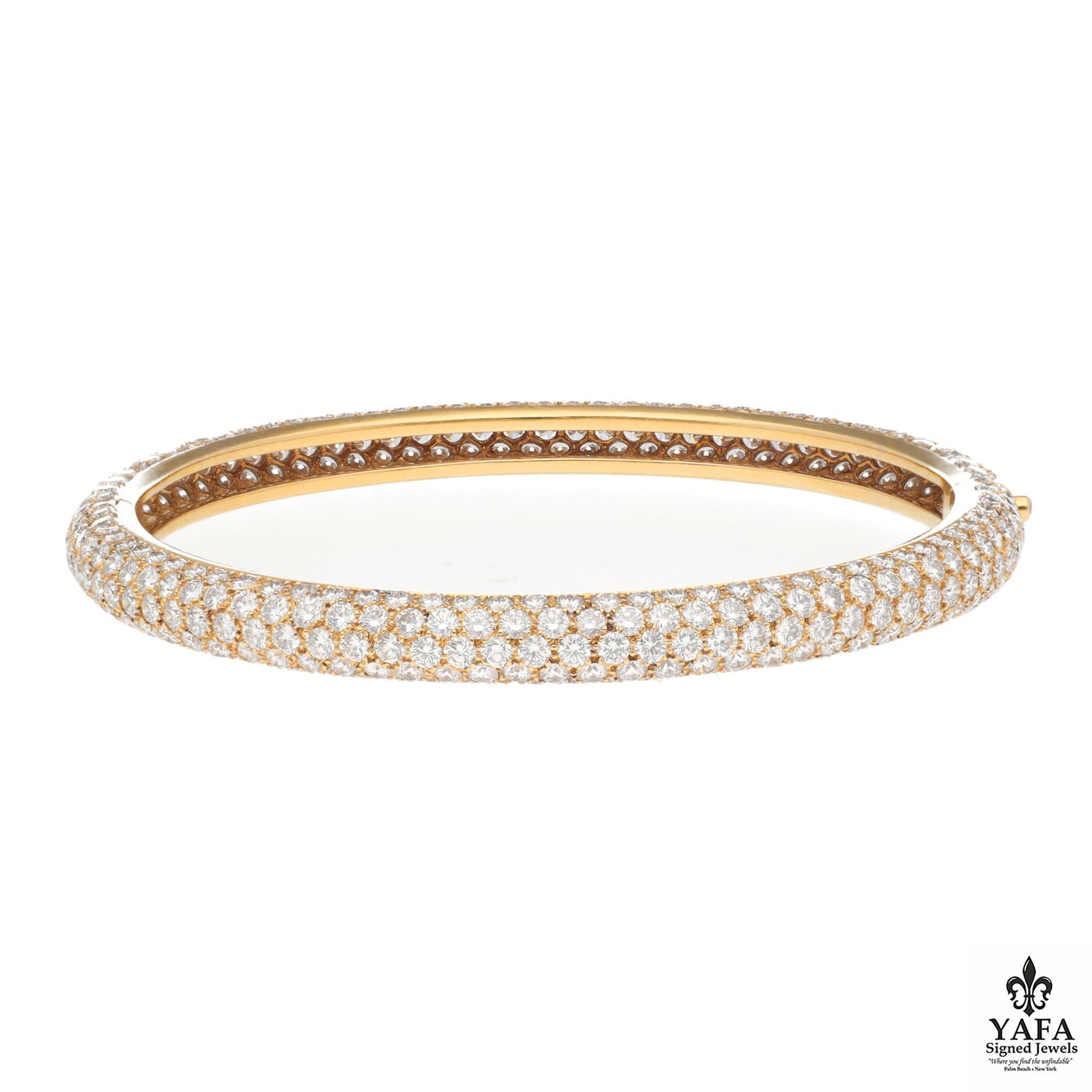 Cartier 18K Yellow Gold Diamond Pave Bangle. Pave Diamonds with a Total Weight of 10.00 CTS Surround the Entirety of This Sleek and Elegant Cartier Creation. Approximate Inner Circumference - 6.50