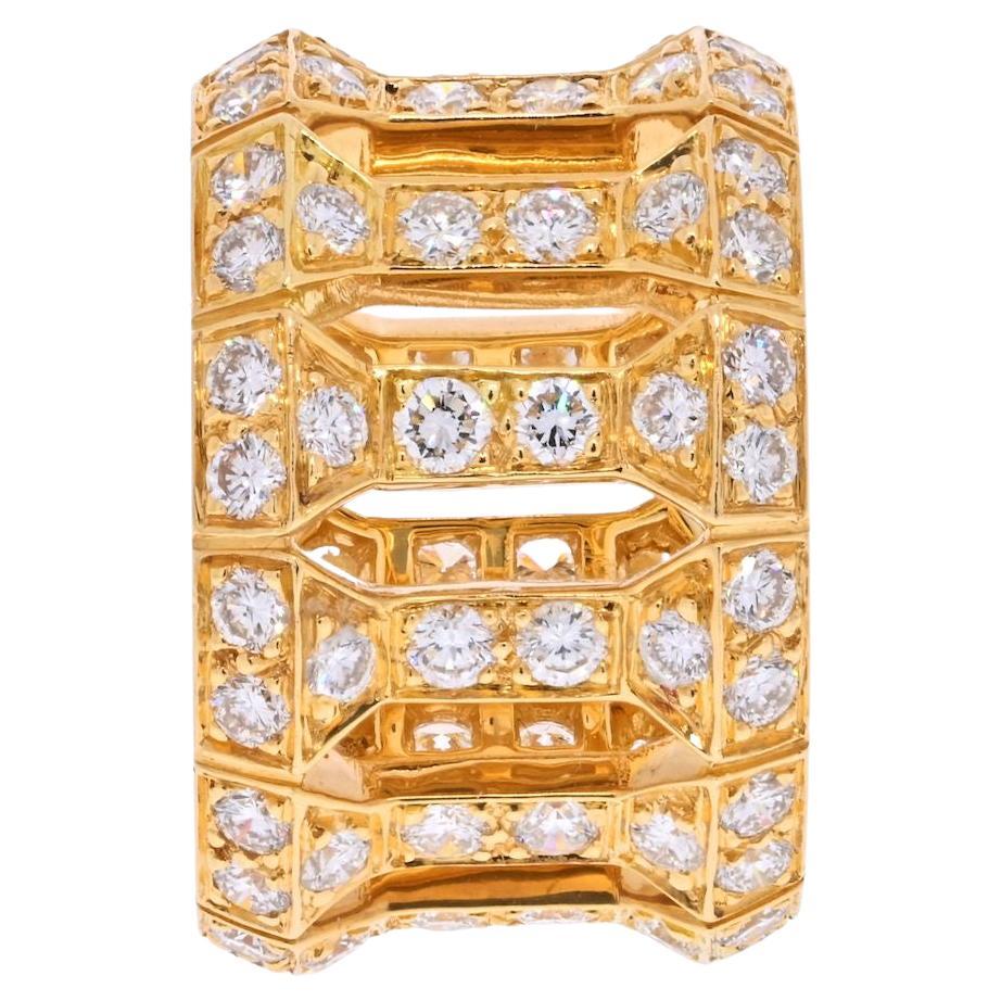 A stunning yellow gold diamond Pillar ring by Cartier. The ring is formed of 11 pillar style links, each set with 8 round brilliant cut diamonds. There are 88 diamonds in total with an approximate carat weight of 3.52ct, predominantly F-G colour and