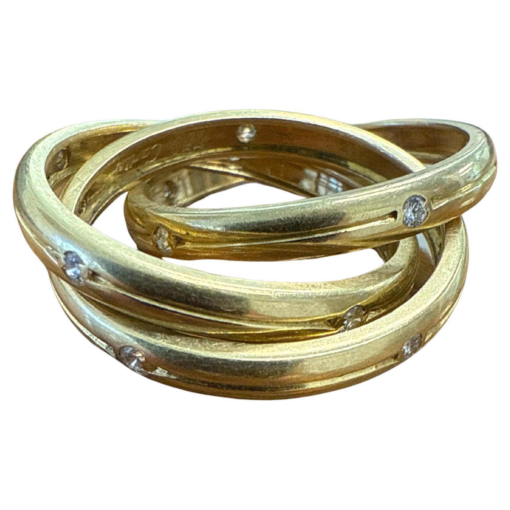 CARTIER Or jaune 18k et diamants TRINITY COLLECTION Bagues roulantes / Rings 1980 en vente