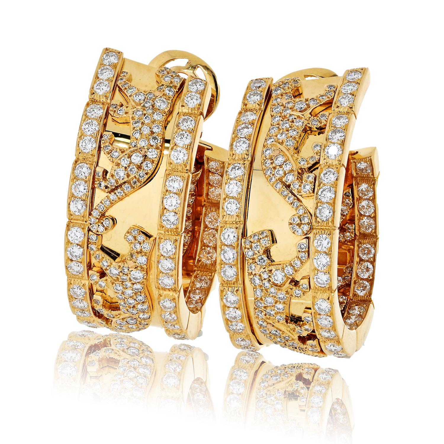 Cartier Vintage “Panthère de Cartier” walking panther diamond hoop earrings.

Indulge in the timeless allure of these exquisite Cartier 18k Yellow Gold Walking Panthère Diamond Hoop Earrings, a true embodiment of sophistication and craftsmanship.