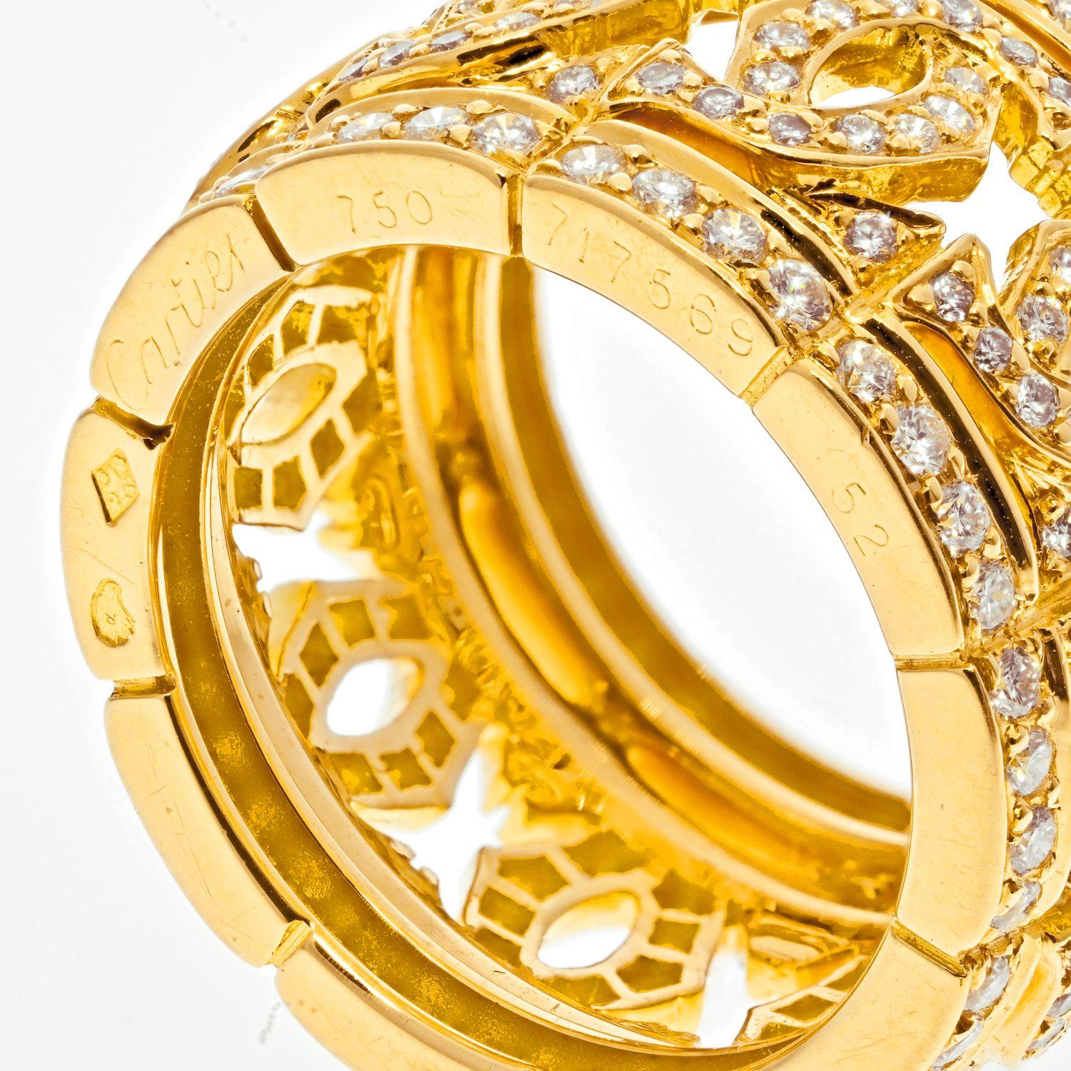 Cartier Entrelaces Ring aus 18 Karat Gelbgold mit Doppel-C-Diamant (Rundschliff) im Angebot