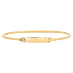 Cartier 18K Yellow Gold Double C Hinged Bangle Bracelet