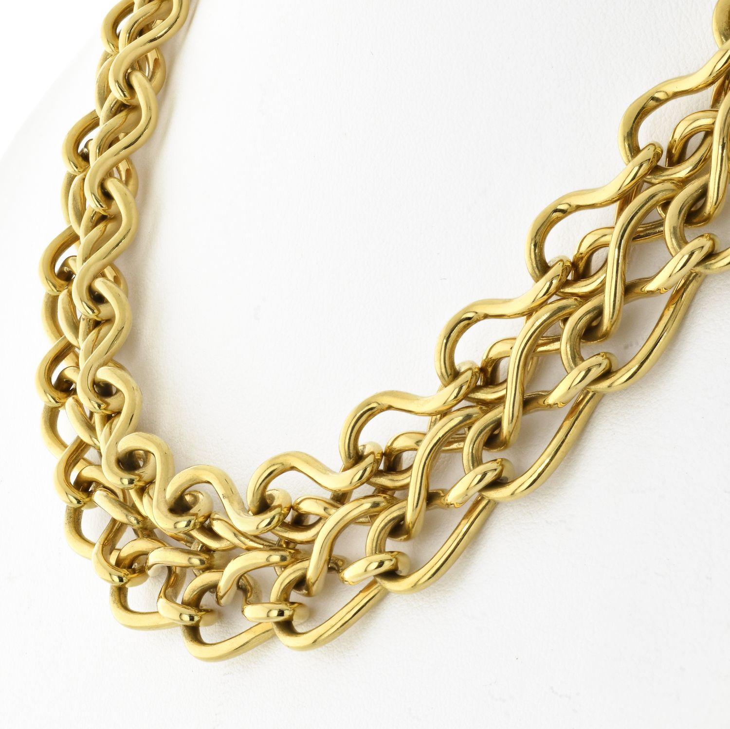 Excellent double row chain collar necklace by Cartier. It is vintage but looks just as new as it looked 30 years ago. Crafted in solid 18K Yellow Gold. Polished finish. 
Secure locking mechanism. Signed with French markes and jeweler's mark, as well