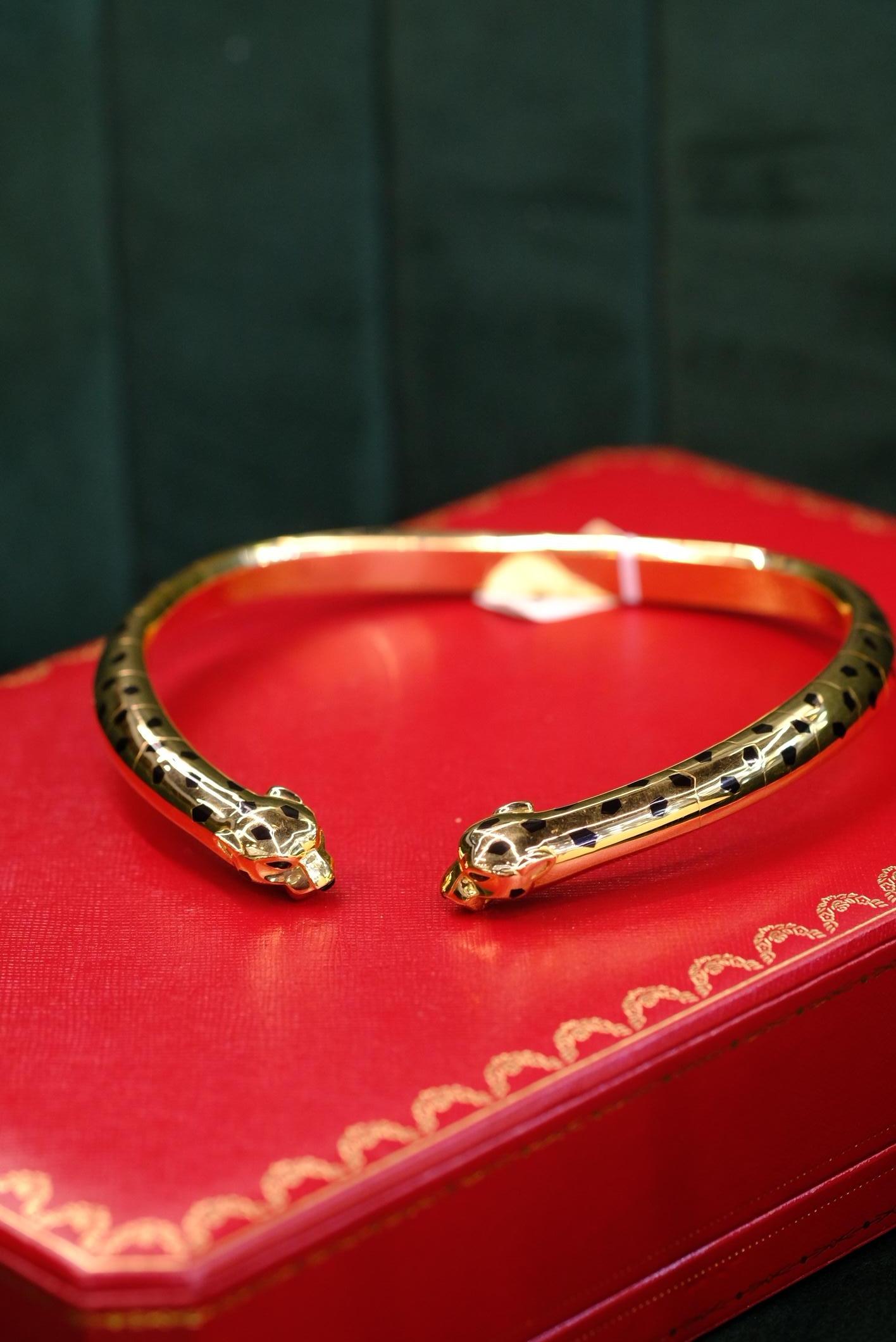 Contemporain Collier double panthère en or jaune 18K de Cartier en vente