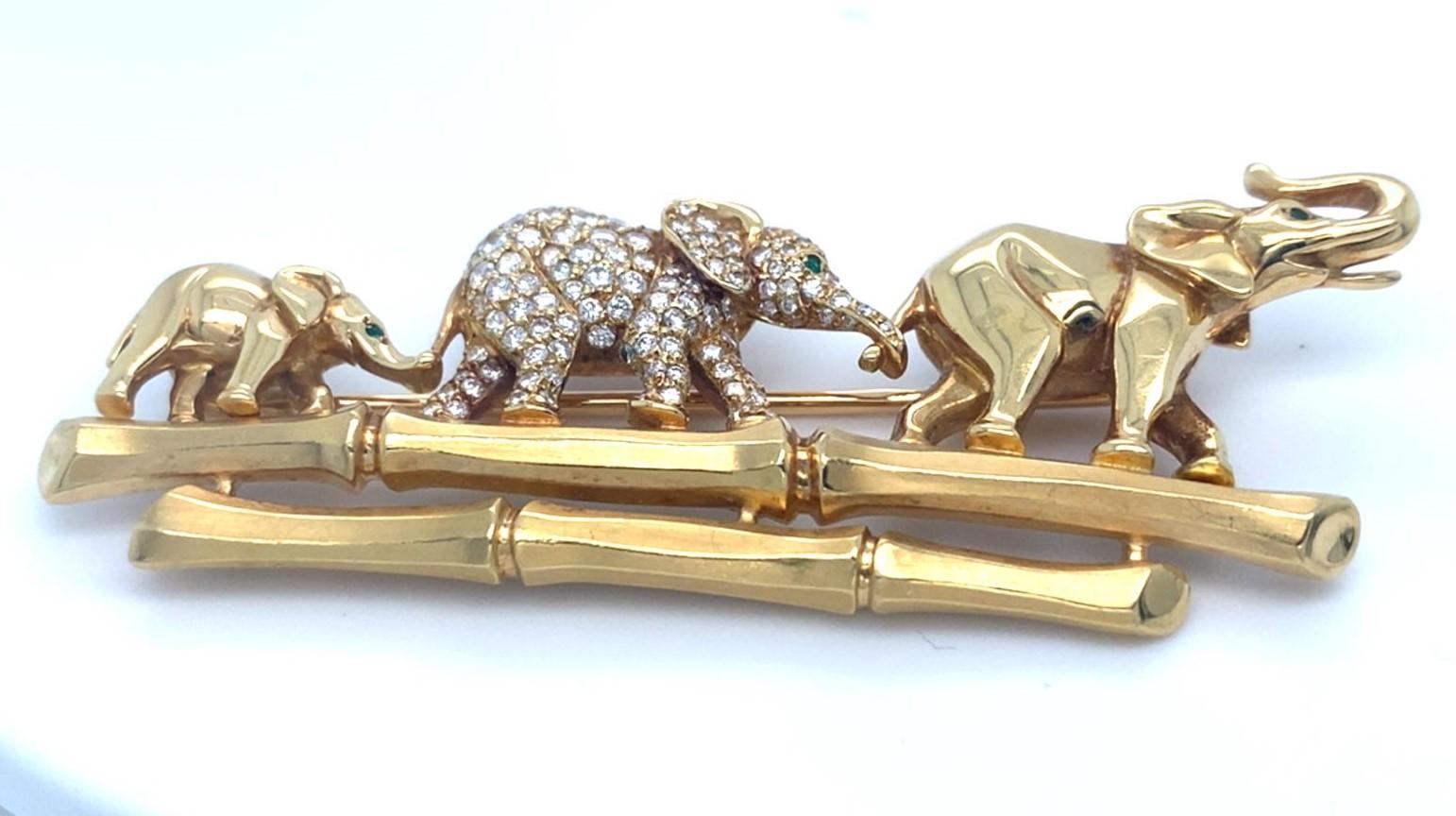 Modern Cartier 18k Yellow Gold Elephant Family Brooch with Emerald & Diamond Accents For Sale