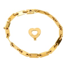 Cartier 18k yellow gold fidelity bracelet with heart key