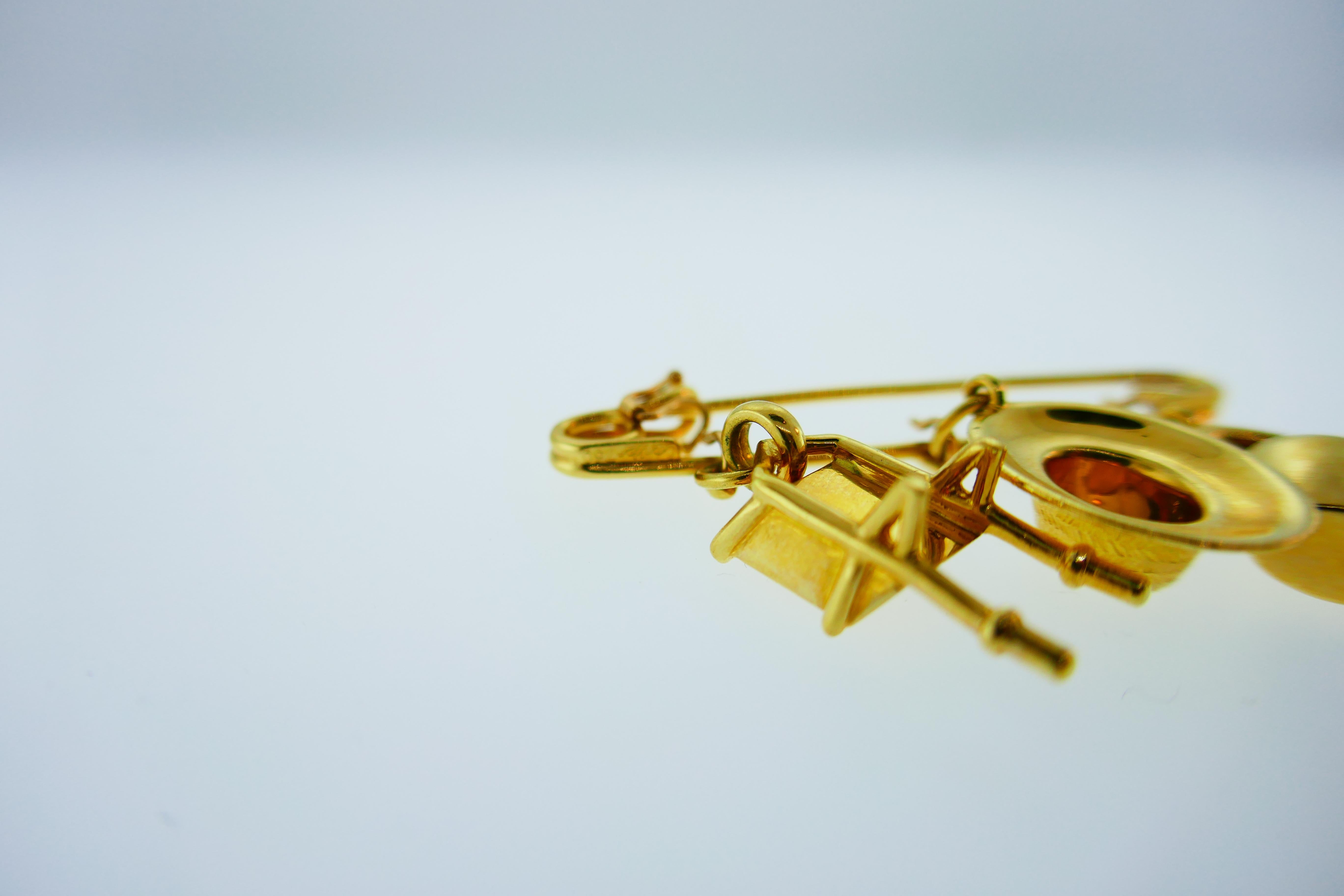 Cartier 18k Yellow Gold Gardening Motif Safety Pin with Charms, circa 1990s Rare In Excellent Condition In Beverly Hills, CA