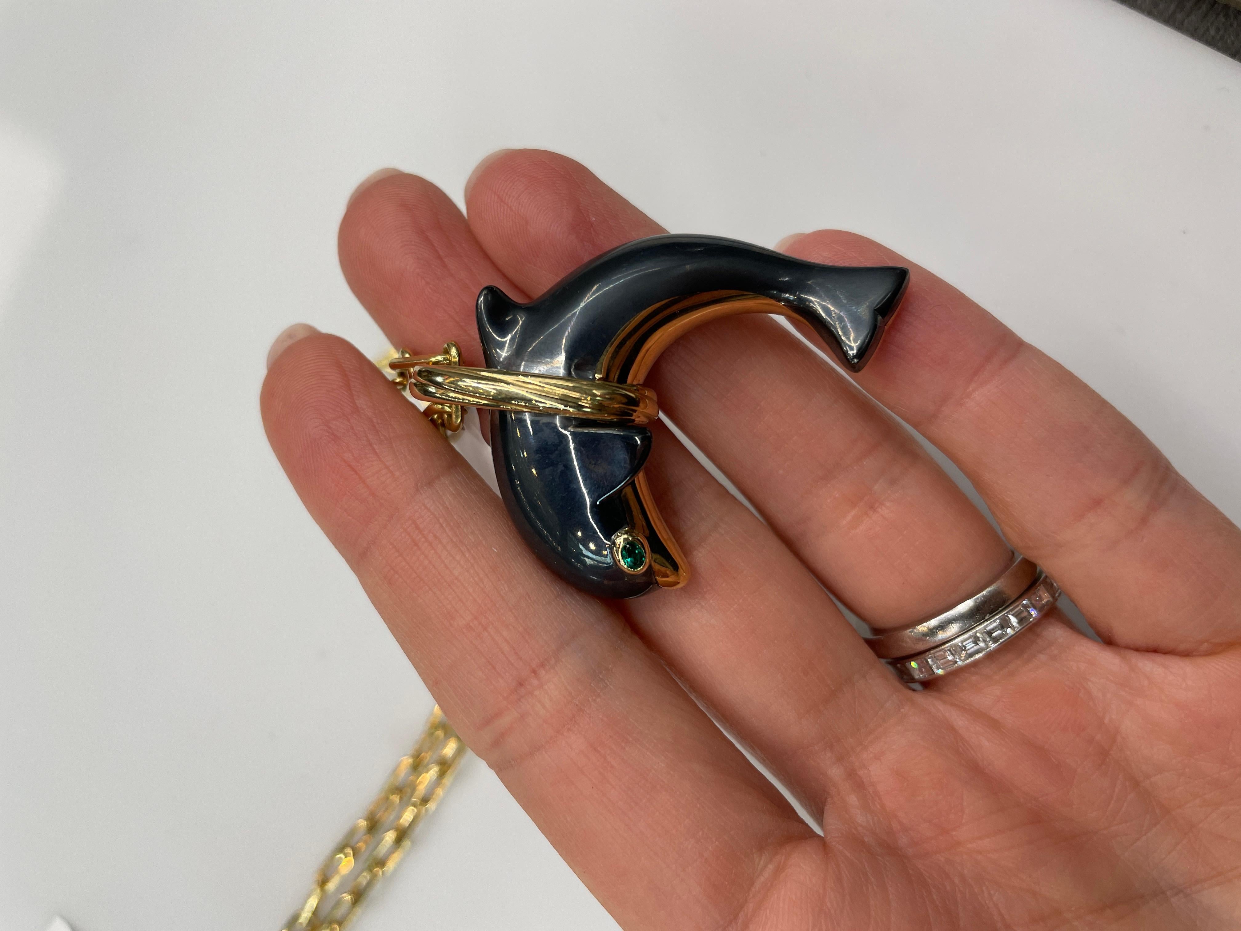 Modern Cartier 18k Yellow Gold Hematite Dolphin Spartacus Chain Pendant For Sale