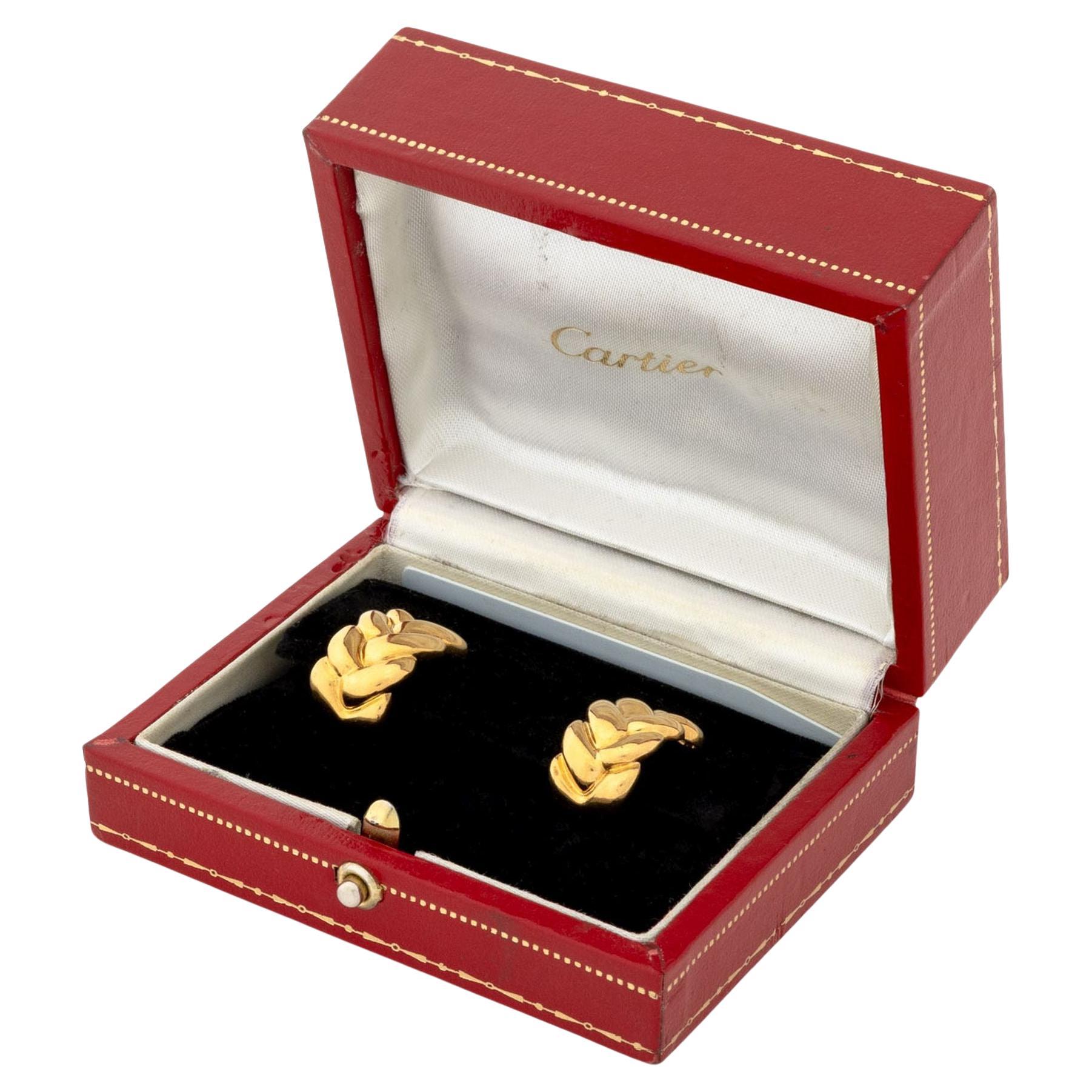 Boucles d
oreilles Huggie en or jaune 18K de Cartier