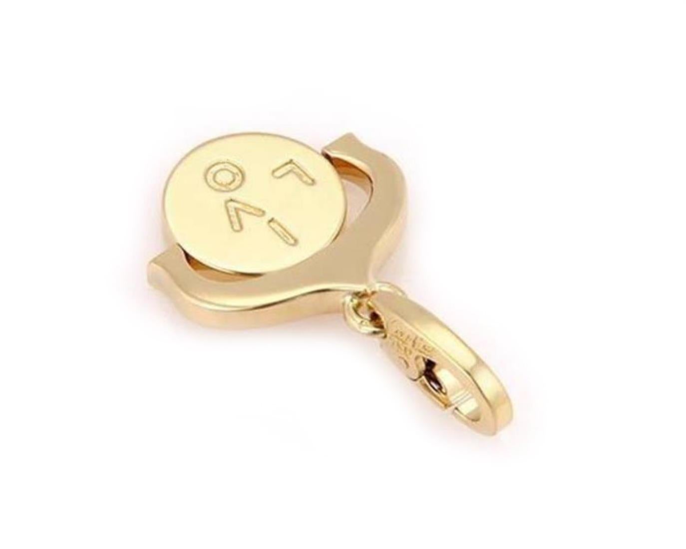 Il s'agit d'une breloque ou d'un pendentif 