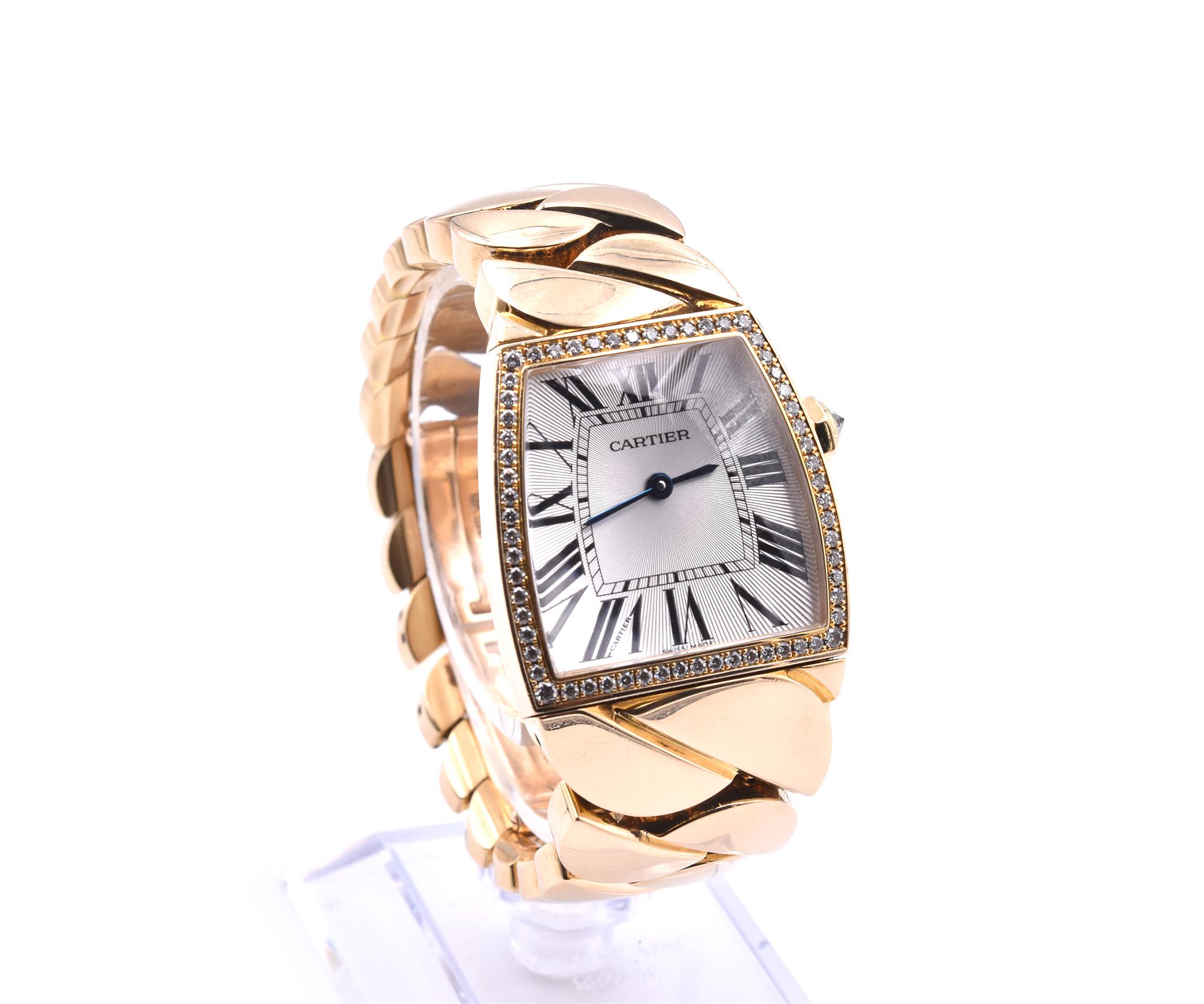 Movement: automatic
Function: hours, minutes
Case: 28mm 18k yellow gold case, diamond bezel, push/pull crown,  
Dial: silver dial with black Roman numerals, blue steel hands
Band: 18k yellow gold band, double fold down clasp, will fit up to an 8-