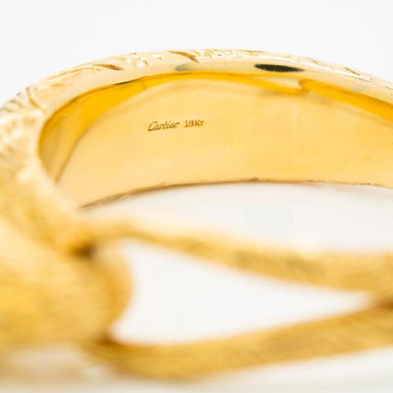 Cartier 18 Karat Yellow Gold Lion Bangle, circa 1960s In Excellent Condition In New York, NY