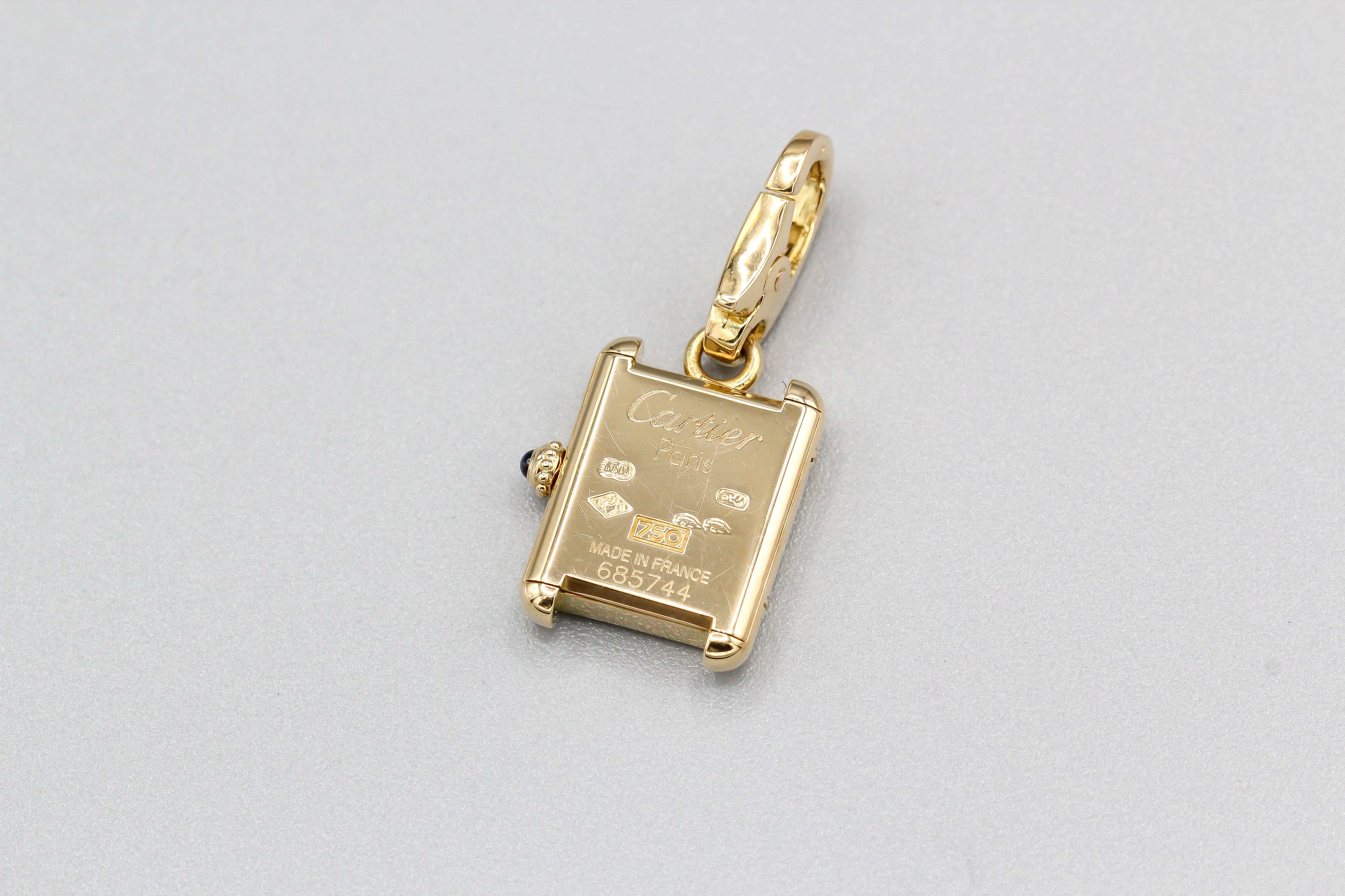 Fine and rare 18k yellow gold Louis Cartier watch charm by Cartier.

Hallmarks: Cartier Paris, 750, reference numbers, French 18k gold assay marks, maker's mark, MADE IN FRANCE.