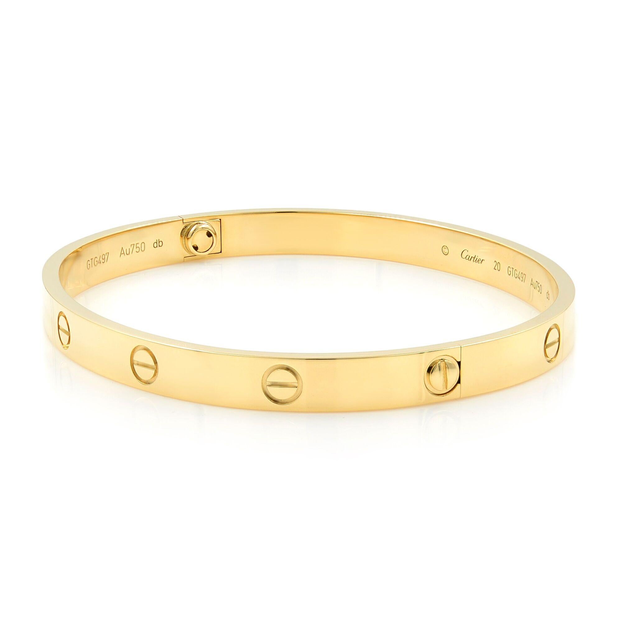 Cartier Love Bracelet Size 20 18K Yellow Gold.
Authentic and beautiful with no signs of wear this bangle is a statement of luxury and class.
Comes with screwdriver, box and papers.
The bracelet is marked 
