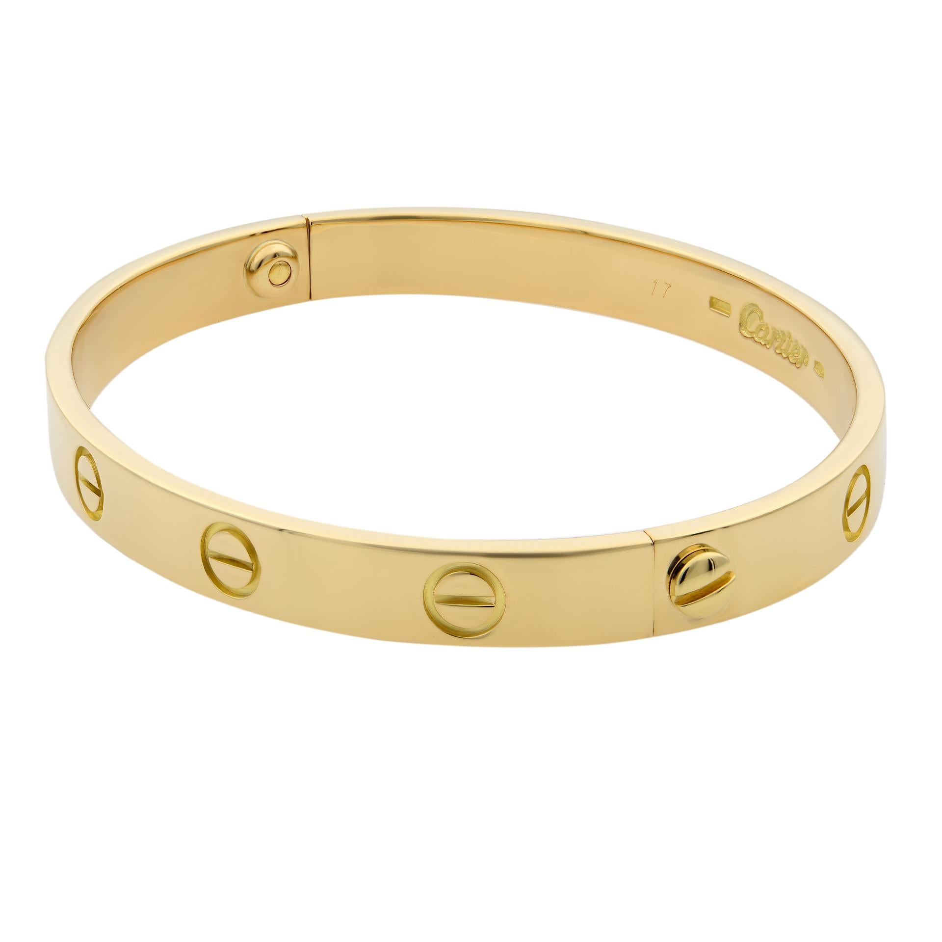 Cartier Love bracelet, 18K yellow gold. Old screw system. Width: 6.1mm. Size 17.
Condition: pre-owned, looks great. Comes with a screw driver. Box and papers are not included.