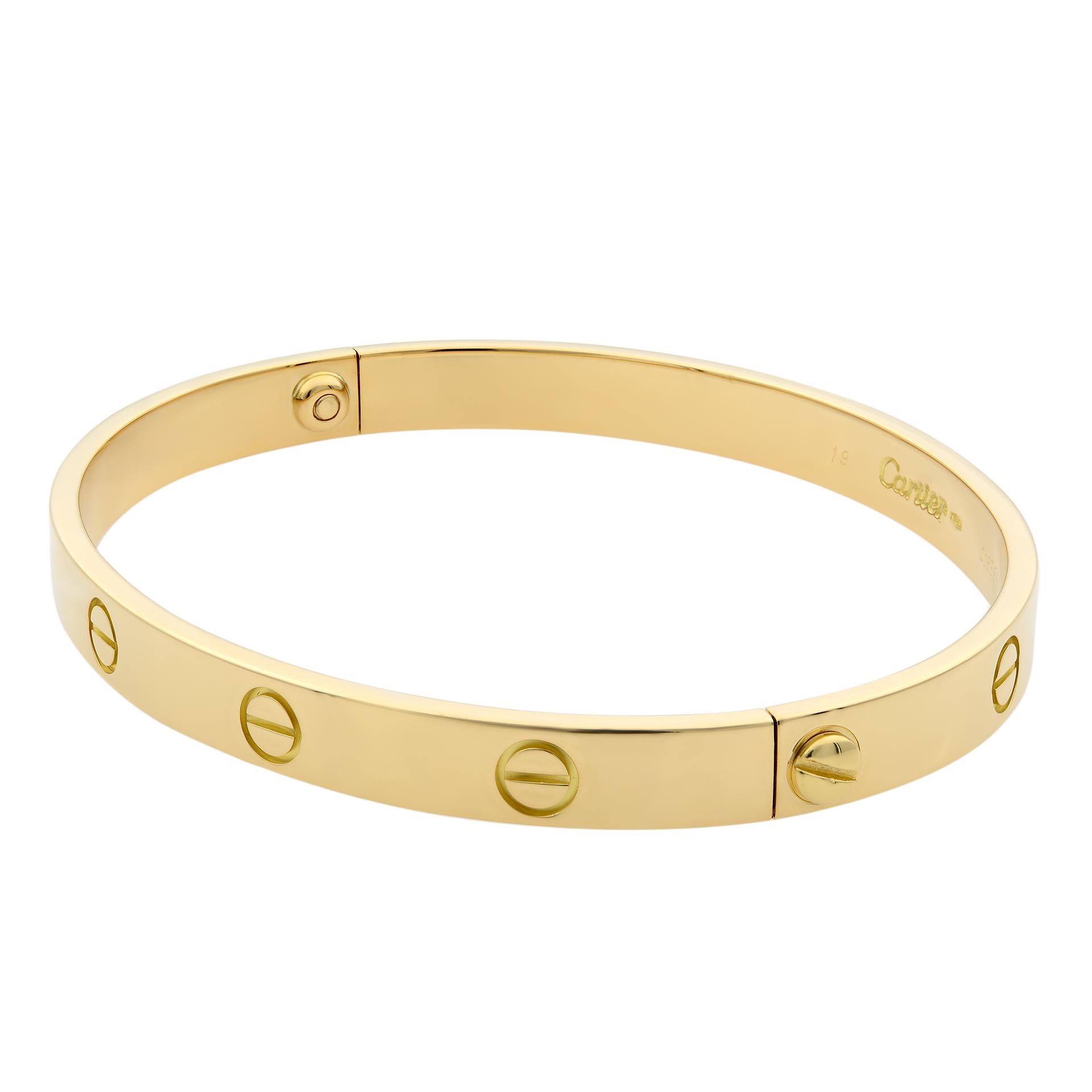 Cartier Love bracelet, 18K yellow gold. Old screw system. Width: 6.1mm.  Size 19.
Condition: pre-owned, looks great. Comes with a screw driver. Box and papers are not included. 