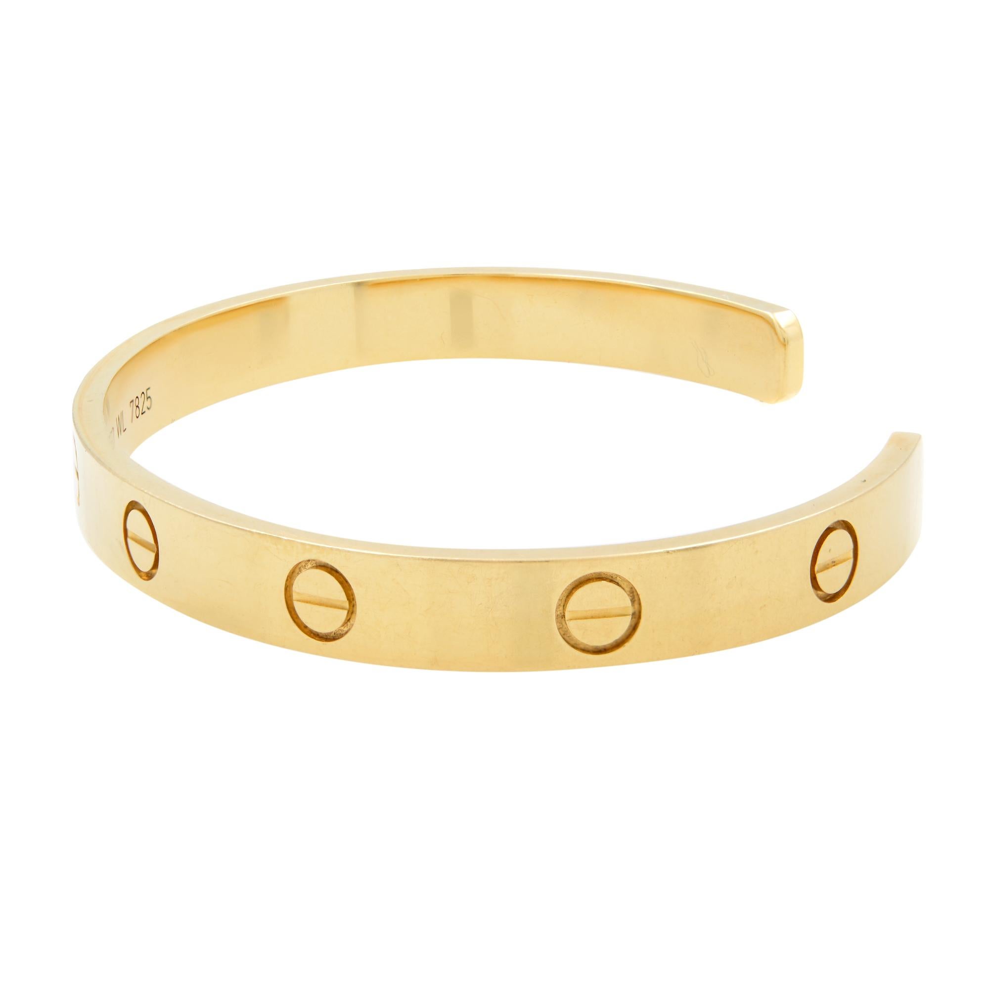 Cartier Love cuff bracelet in 18K yellow gold. Width: 6.2mm. Size 18. Great pre-owned condition. Original box and papers are not included. Comes with a Cartier pouch.