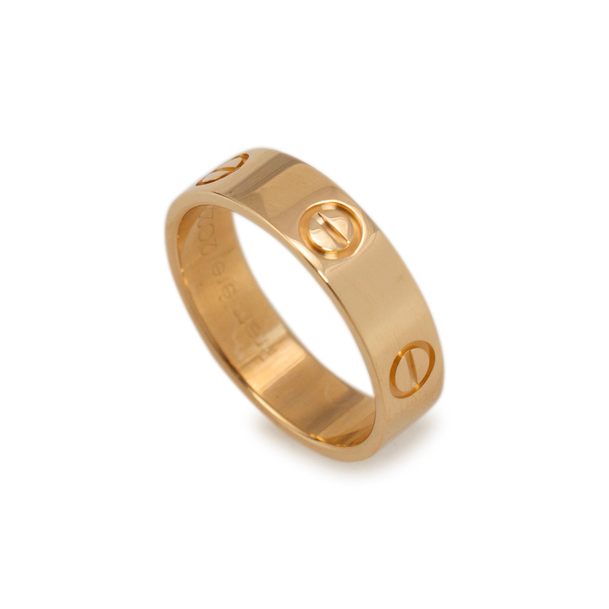 Brand: Cartier 

Metal Type: 18K Yellow Gold

Ring Size: 8.5

Width: 5.50 mm

Weight: 6.38 grams

One 18K yellow gold ring with a soft-square shank. The metal was tested and determined to be 18K yellow gold. Engraved with 
