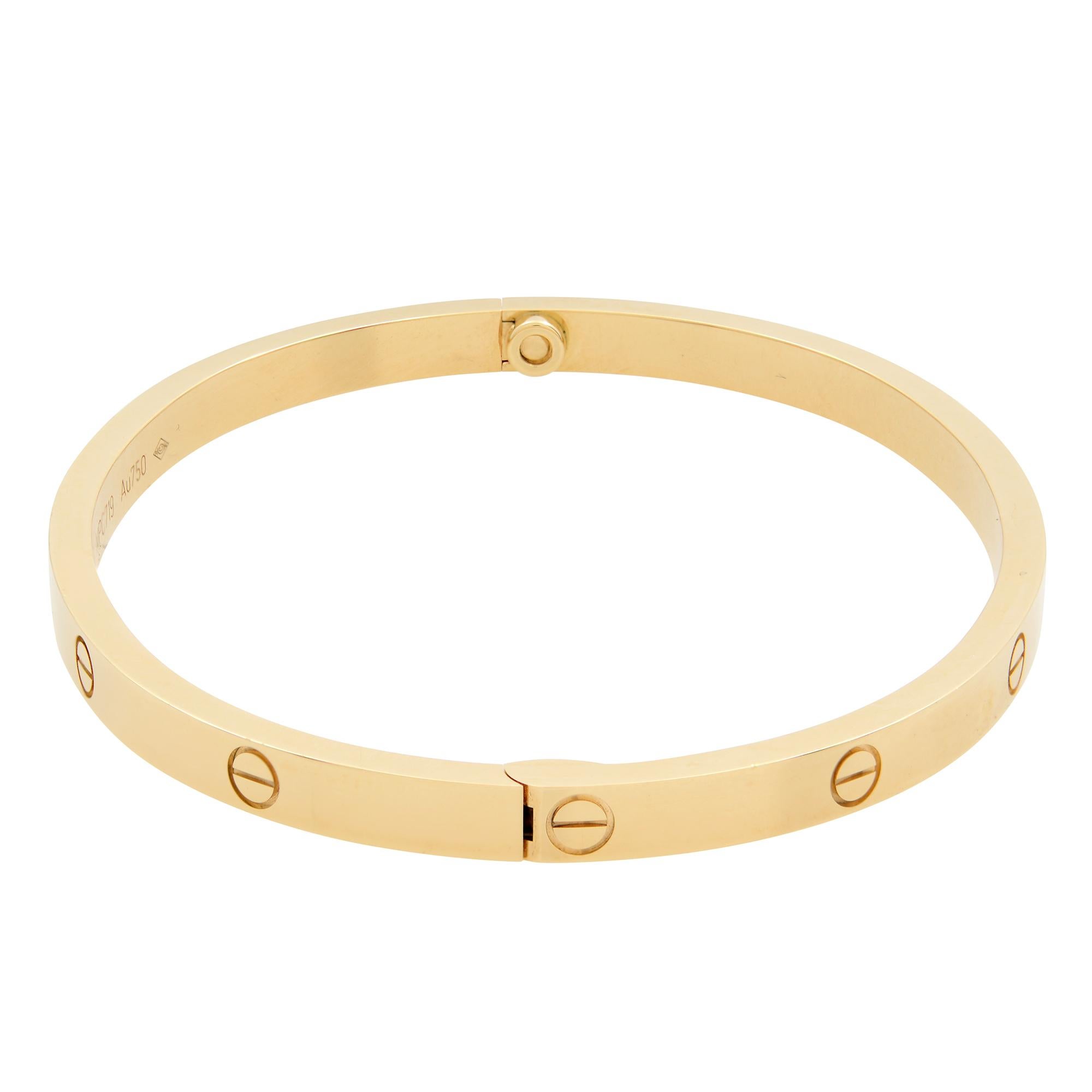  Cartier Love bracelet in 18K yellow gold, small model. Width: 3.65mm. Size 16. Excellent pre-owned condition. Comes with original box, papers and a screwdriver.