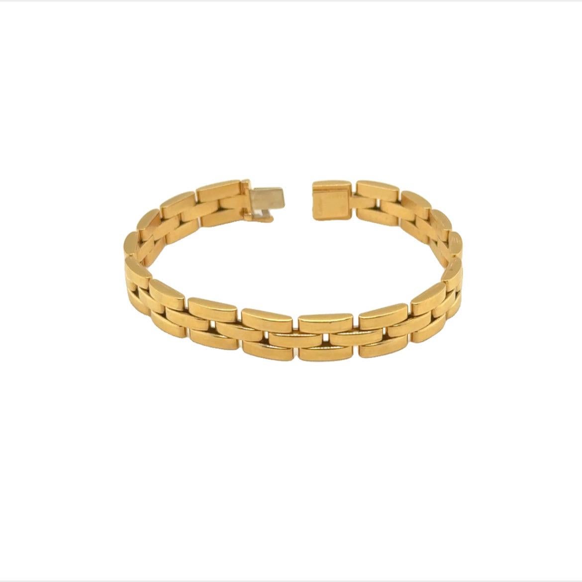 This Cartier 'MAILLON PANTHÈRE' bracelet features 18K yellow gold in a three row brick link design.7 1/4 inches long. Gross weight: 26.50  dwt. Stamp: 750 848545 Cartier (French hallmark)(maker's mark).
