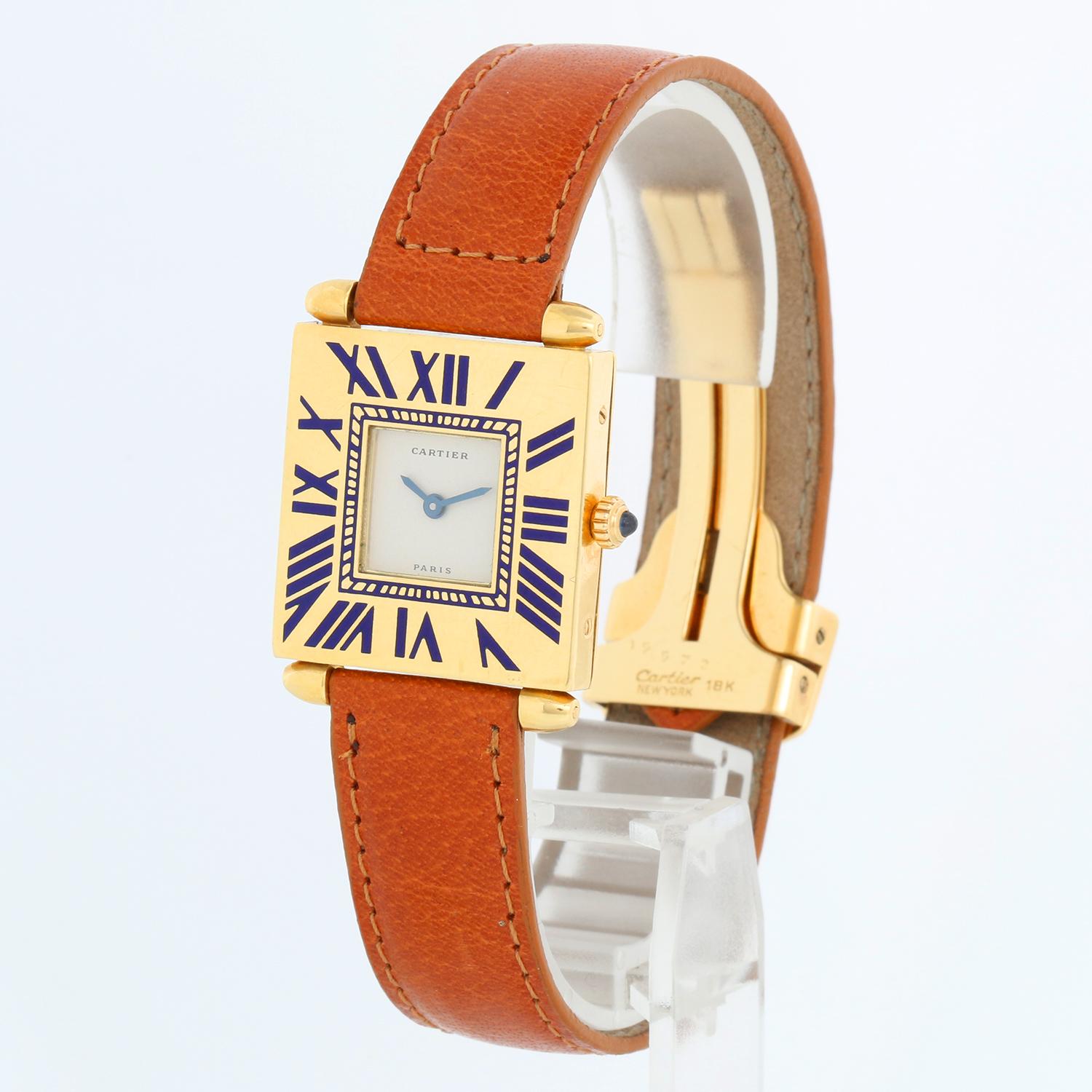 Vintage Cartier Art Deco 18k Yellow Gold Large Size Quadrant Watch  - Quartz. 18K Yellow gold (25 mm x 32mm ) Inlaid blue enamel  Roman numerals. Ivory dial with blue hands. Tan Cartier strap with  Cartier 18K gold deployant buckle. Pre-owned with