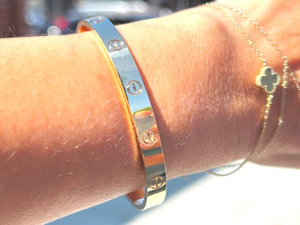 The LOVE bracelet has been an icon of jewelry design since its creation in New York in 1969
 
Comes with original pouch & service papers from Cartier

Brand= Cartier
Model= Love
Serial#= 11DXXX
Size= 18
Metal= 18K Yellow Gold
Weight= 25.10
