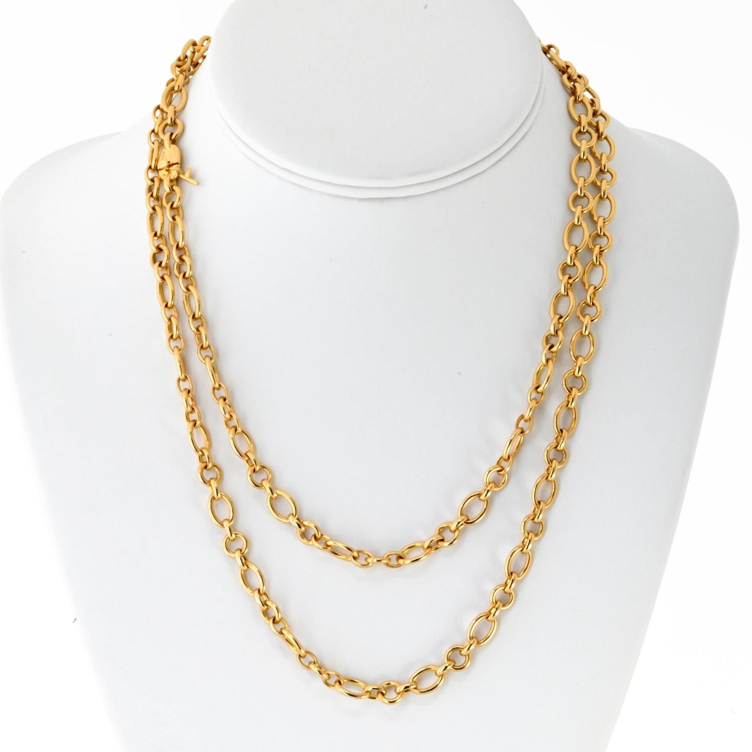 This Cartier 18K yellow gold long chain is a distinguished estate piece from circa 1991, showcasing a refined combination of oval and round links. 

Measuring 36 inches, its high-polished finish enhances its timeless elegance, making it perfect for