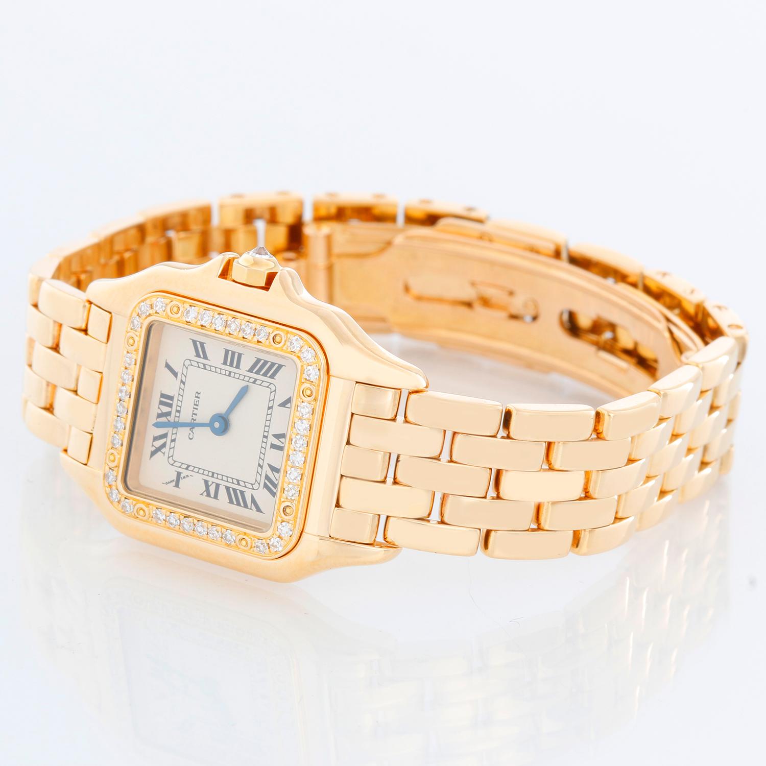 Cartier 18K Yellow Gold Panther Ladies Watch WF3254B9 1280 - Quartz. 18K Yellow Gold with diamonds (30 x 21 mm) ; Diamond bezel . Ivory dial with black Roman numerals. 18K Yellow Gold Panther bracelet with deployant buckle. Pre-owned with Cartier