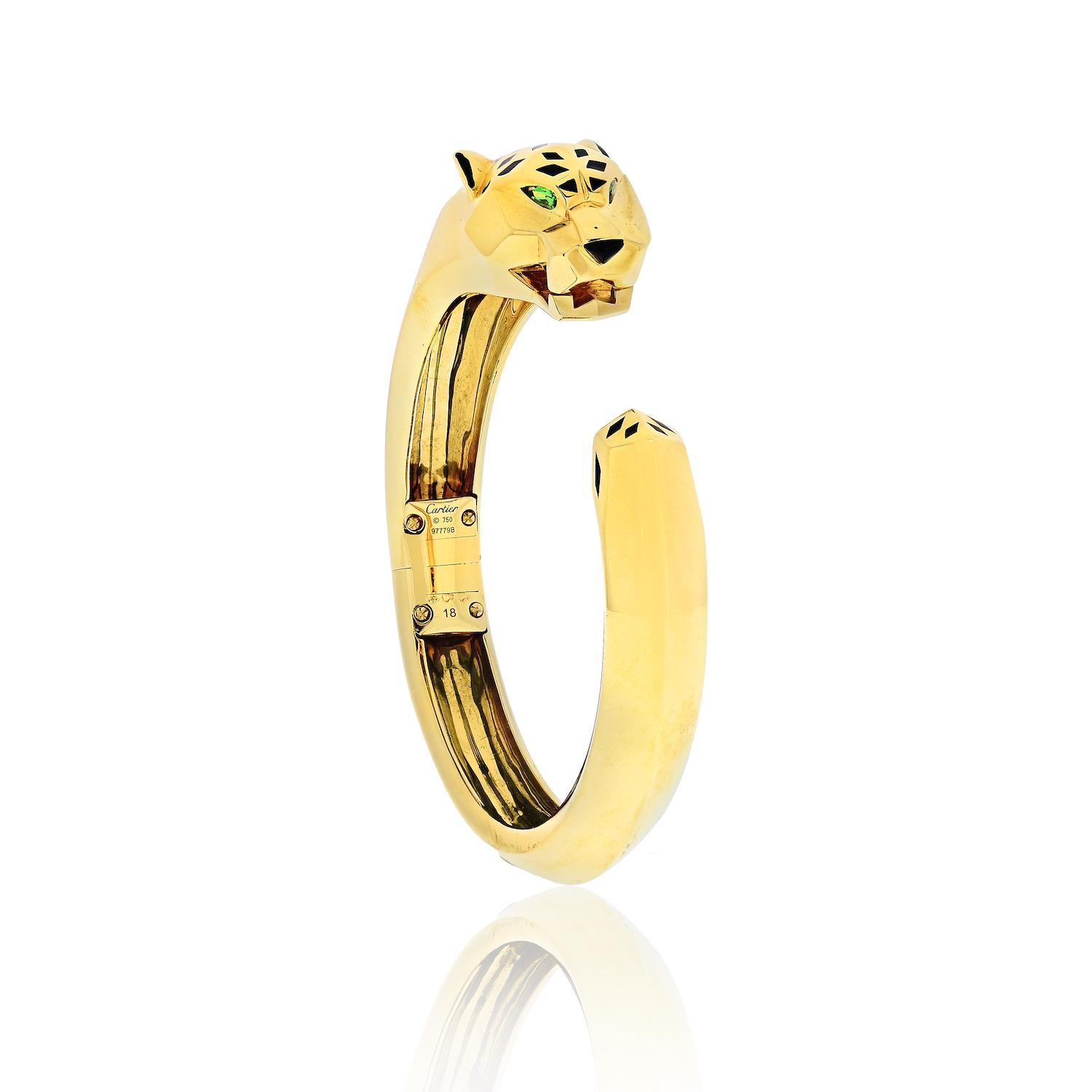 Cartier Bracelet jonc panthère en or jaune 18 carats Excellent état - En vente à New York, NY