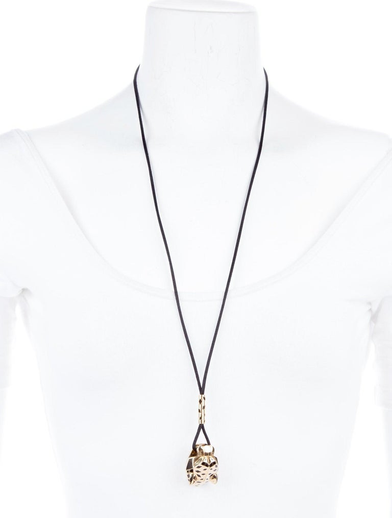 Cartier 18 Karat Yellow Gold Panthère De Pendant on a Silk String ...