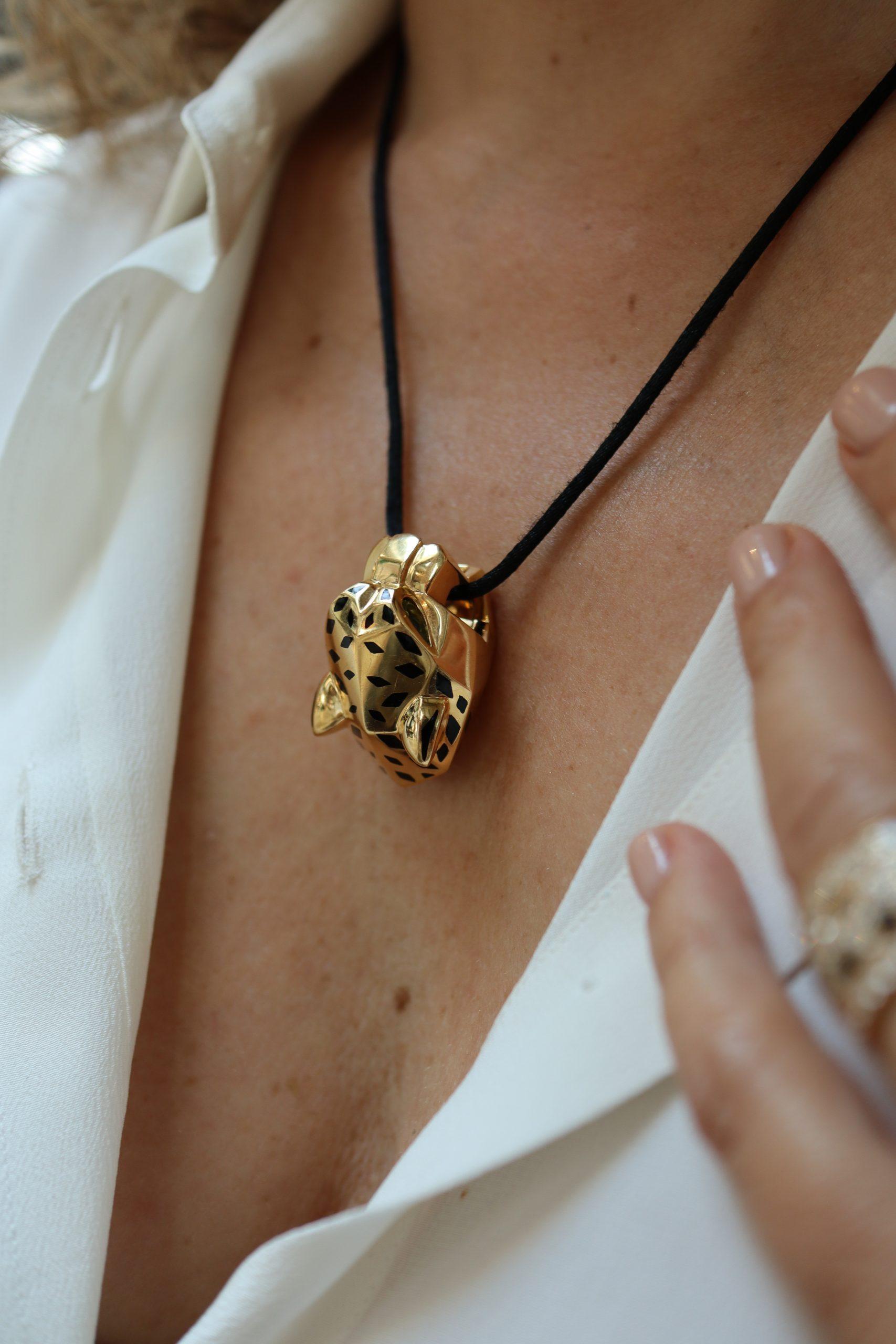 Modern Cartier 18K Yellow Gold Panthere On A Black Cord Necklace For Sale