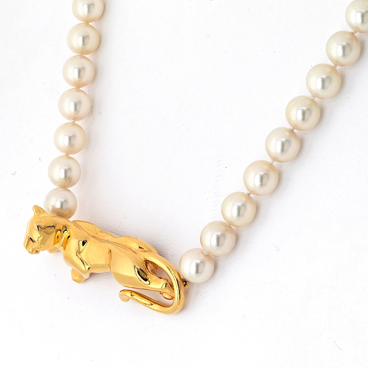 Cartier Halskette, Panther auf einem Perlenring, 18 Karat Gelbgold Damen
