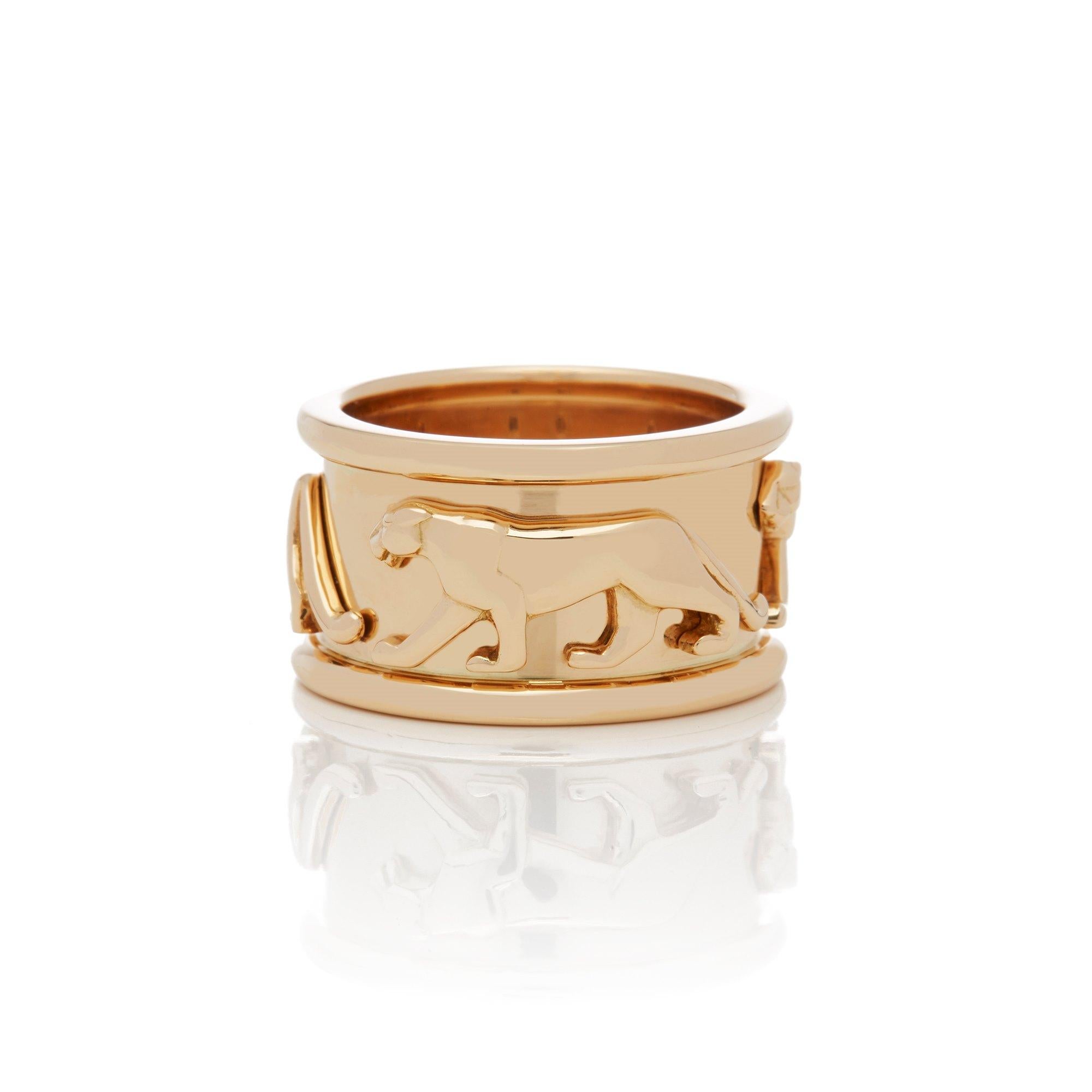 This Ring by Cartier is from their Panthere Collection and features three Signature Panthere's mounted on an 18k Yellow Gold band. UK Size M, EU Size 53, US Size 6 1/2. Complete with Xupes Presentation Box. Our Xupes reference is COMJ186 should you