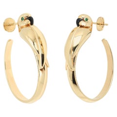 Boucles d'oreilles créoles « Perroquet » Cartier en or jaune 18 carats, CIRCA les années 1980, France