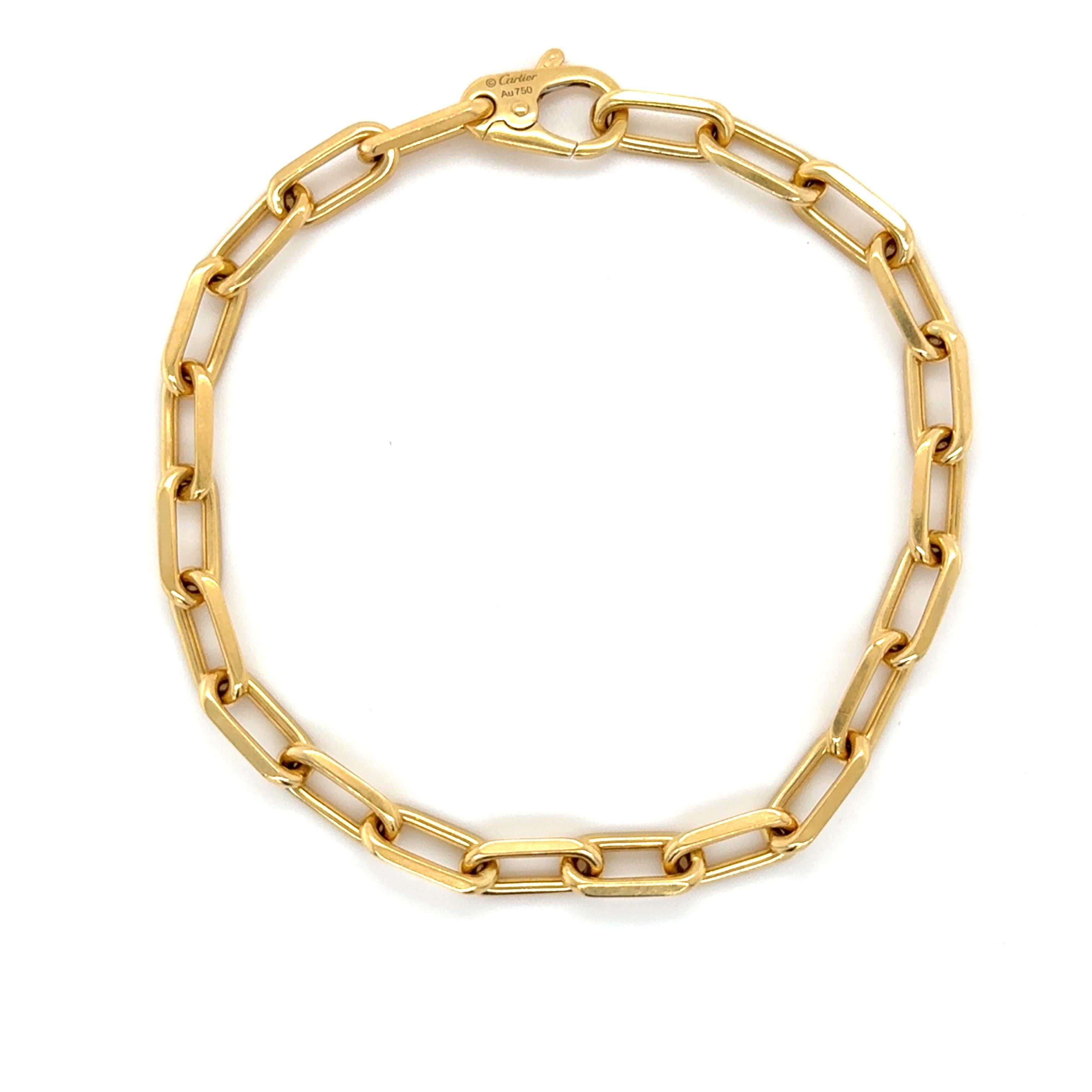 This classic Cartier design, part of the Santos De Cartier collection consists of elongated cable links and lobster clasp. Perfect for everyday wear!

Weight: 21.80 grams
Length: 8 1/2 inches long
Link Width: 6.00 mm
Marked: 'Cartier' 'AU750' &