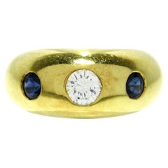 CARTIER Anillo Tres Piedras Oro Amarillo 18k, Zafiro y Diamante c/Cert Años 1990