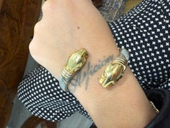 CARTIER Bracelet en or jaune 18k et acier inoxydable Collection Steele