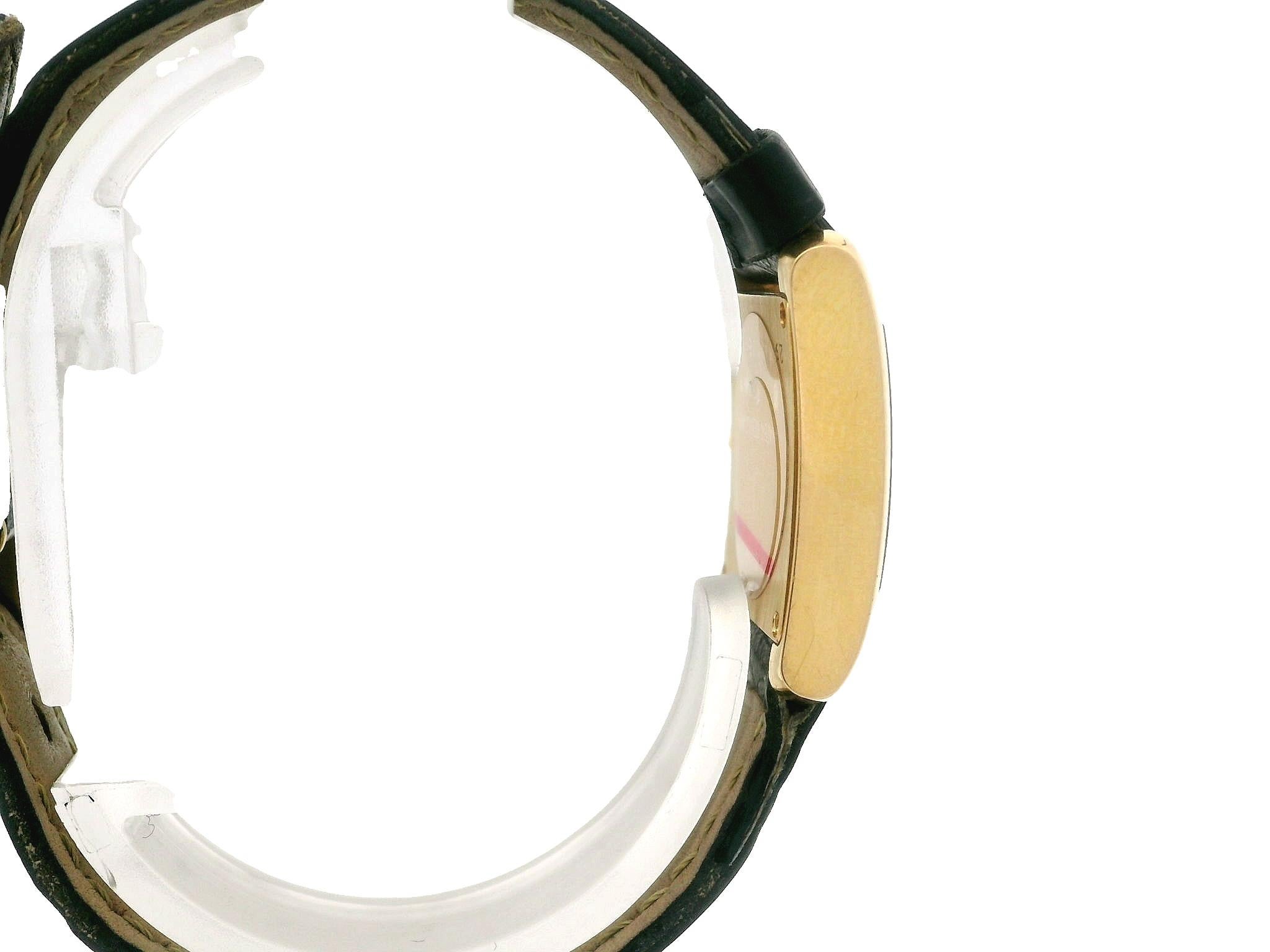 Watchmaker:	Cartier
Movement:	Swiss Made Quartz Movement
Case Material:	Solid 18k Yellow Gold
Gross Weight:	27.5 Grams (including case, movement, and strap)
Case Width:	20mm (not including crown)
Case Height:	25mm (lug to lug)
Strap Type:	Original