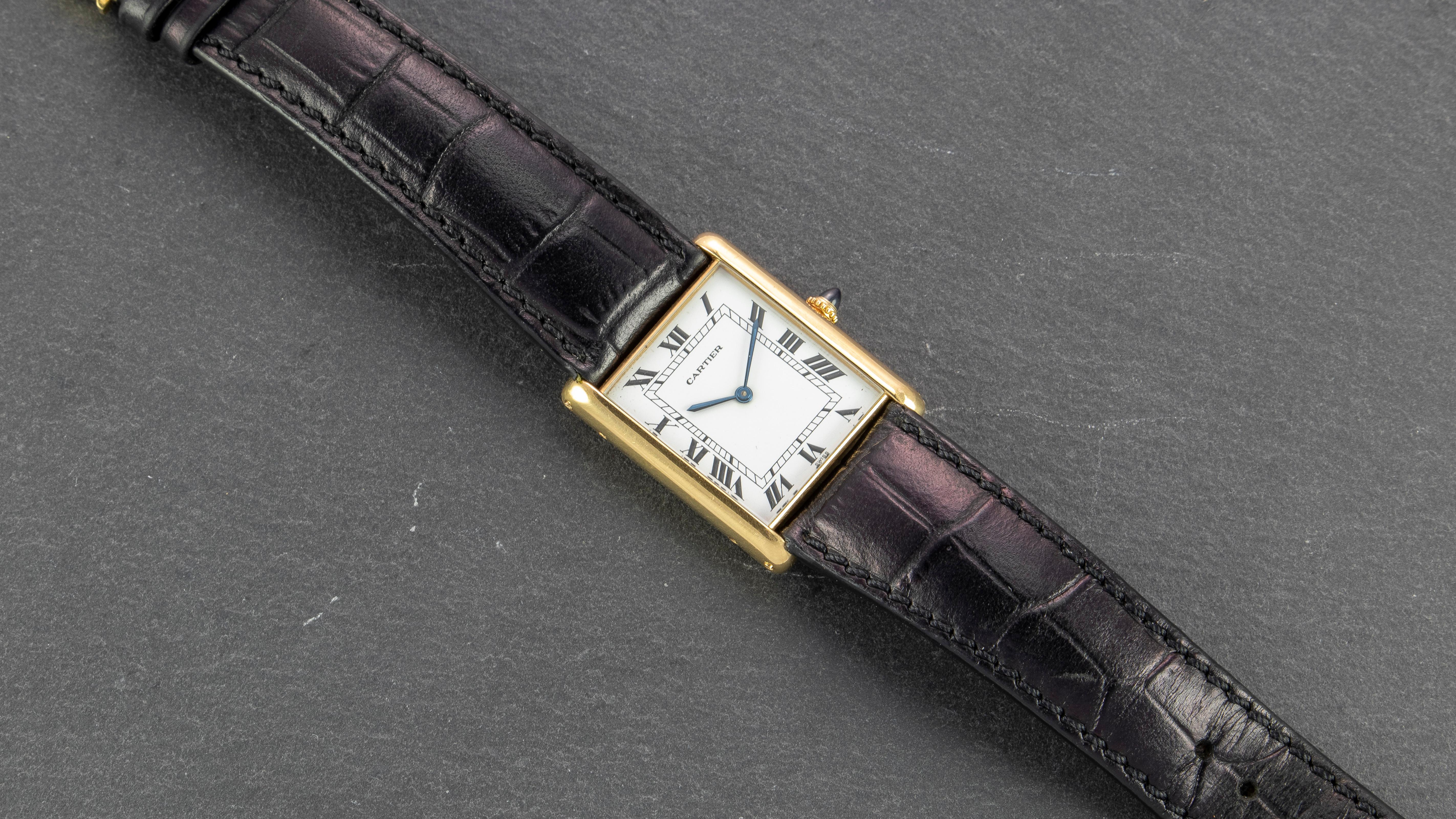 A Timeless Classic, With a Twist.

Cartier 18K Yellow Gold Tank Jumbo Automatic 

The Cartier Tank is an icon. It is timeless. It has graced the wrists of celebrities, dignitaries, and world leaders and has marked important milestones. In 1917, the