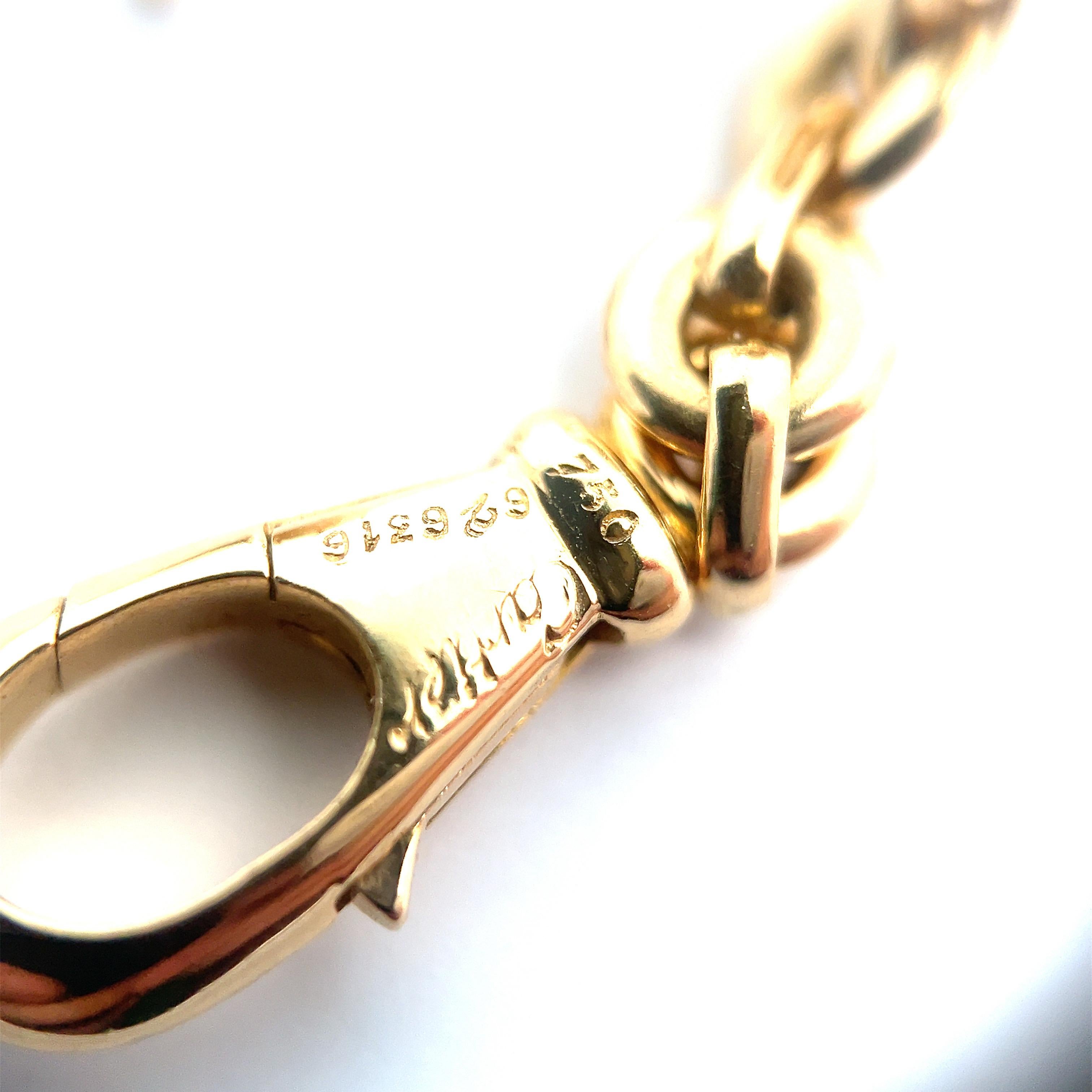 Women's or Men's Cartier 18k yellow Gold Trinity Charm Bracelet  For Sale