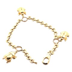 Cartier Bracelet breloque Trinity en or jaune 18 carats