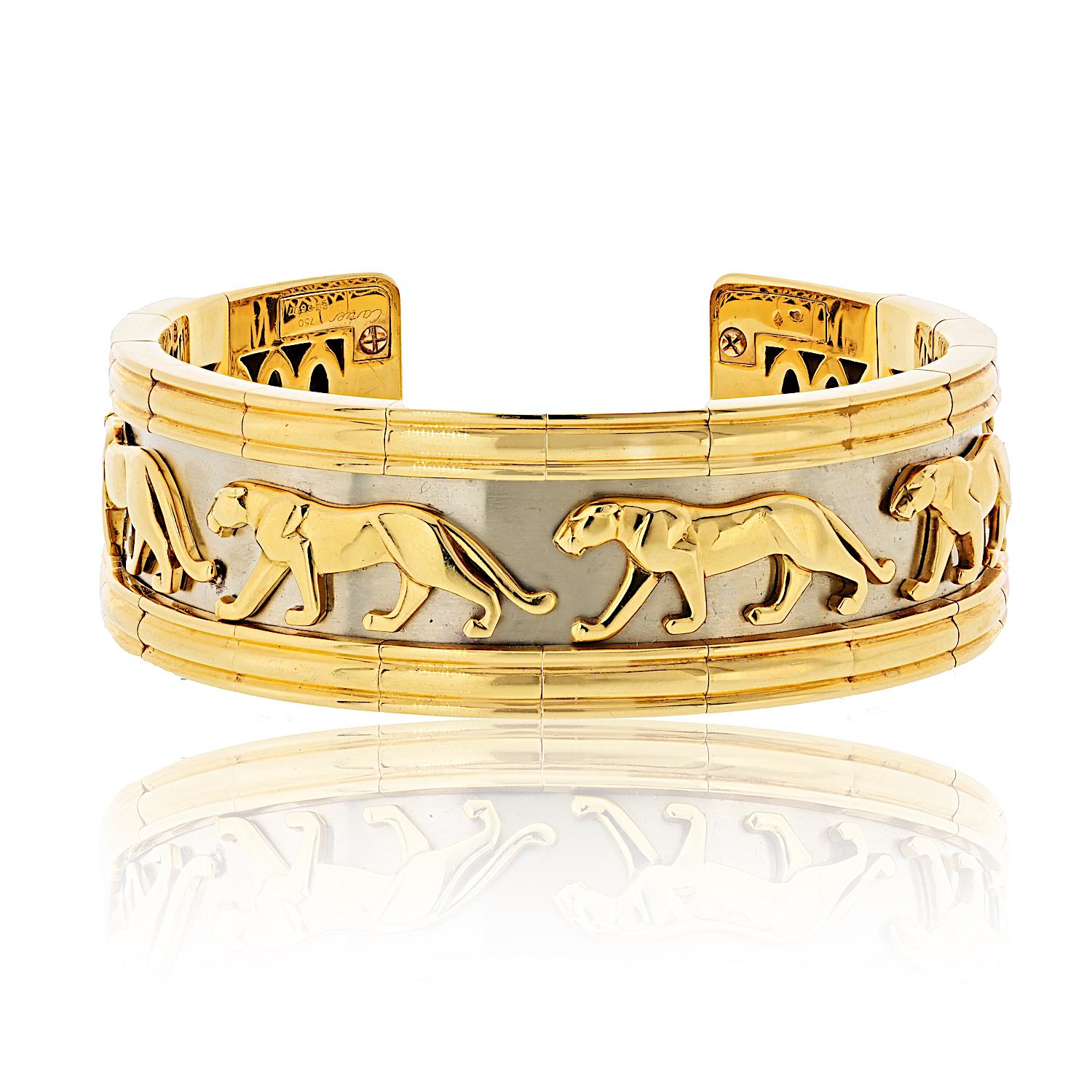 An iconic and powerful statement piece from Cartier, this vintage Walking Panthère cuff bracelet captures the timeless elegance and bold spirit of the Maison's most celebrated motif.

Crafted in rich 18K yellow gold, the bracelet features the