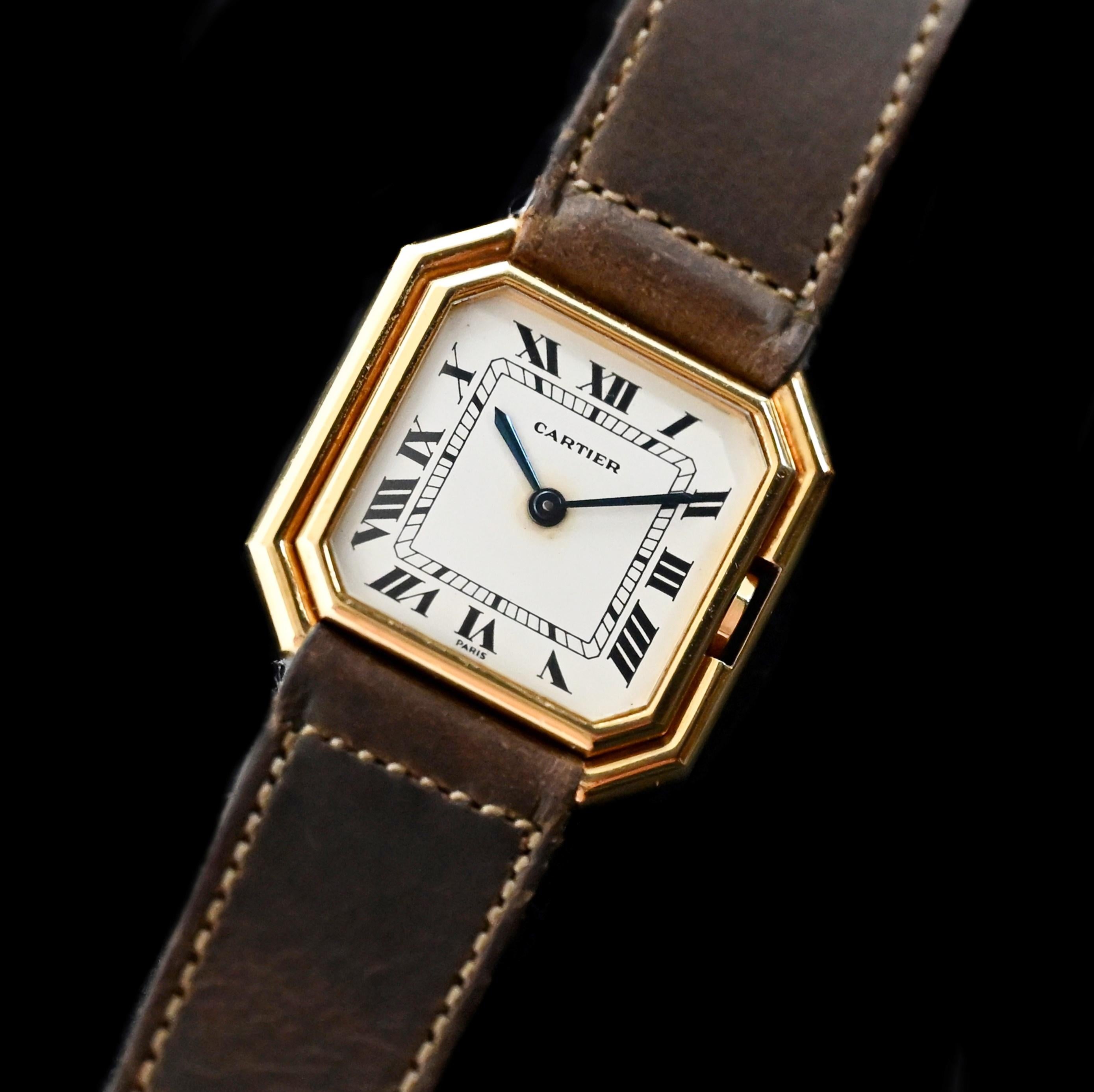 Brand: Cartier
Model: Ceinture 
Year: 1980’s
Serial number: 78099xxxx

Reference: C04360

Case: Show sign of wear 18K Yellow Gold Case with approximate size 27 mm in diameter along with serial number engraved on case back

Dial: Excellent Aged
